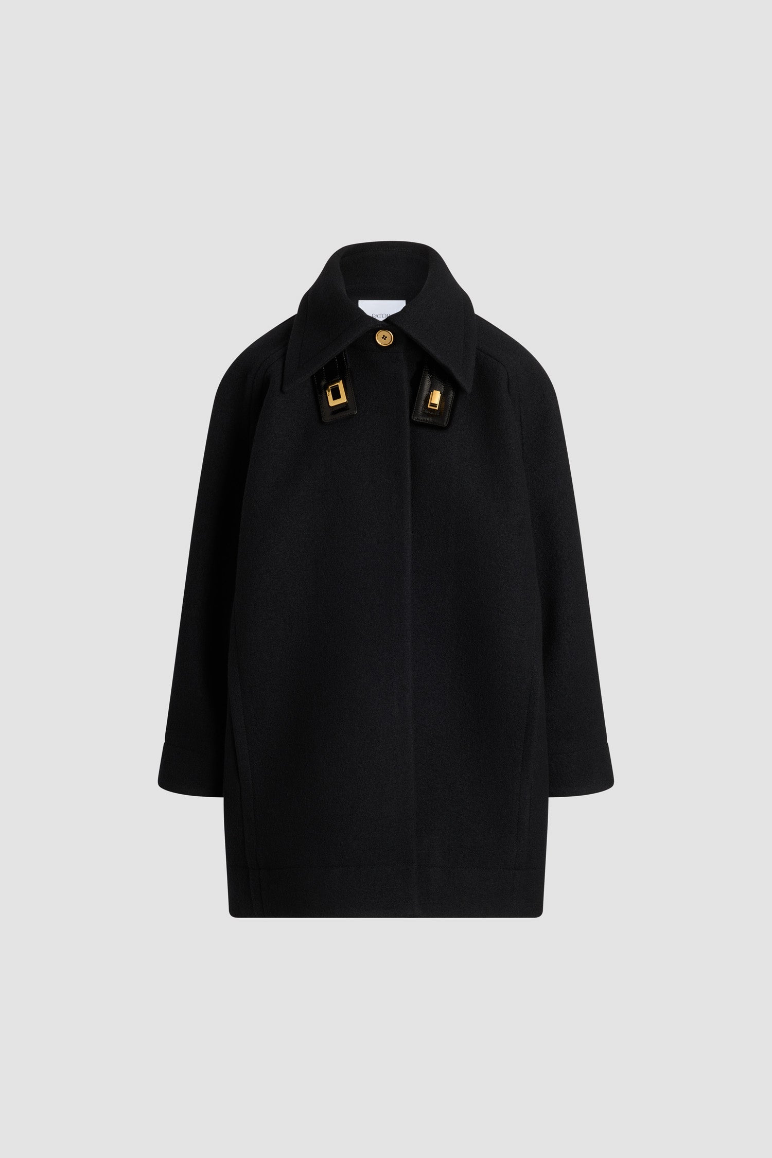 Patou - Parka voluminoso in lana cotta - Black - Parka in lana cotta nera. Colletto largo con linguetta rimovibile vinile chiusa da un lucchetto oro. Chiusura sul davanti con bottone nascosto. Tasche integrate nelle cuciture. Modello foderato.