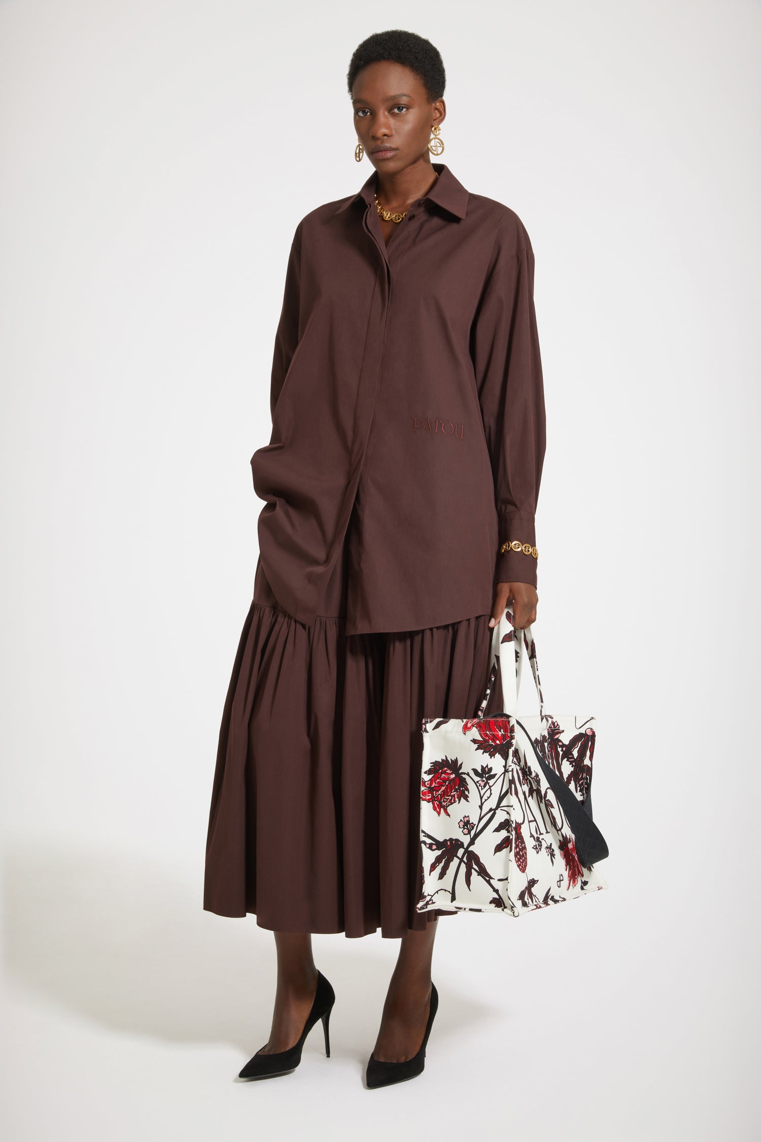 Patou - Buttoned tiered midi skirt in organic cotton - Maya Mountain - Tiers of joy.Maya Mountain brown organic cotton poplin skirt. Midi length. Tiered construction. High waist. Button fastening at the front. Pockets at the sides.This skirt is worn high-waisted. Tight fit at the waist.