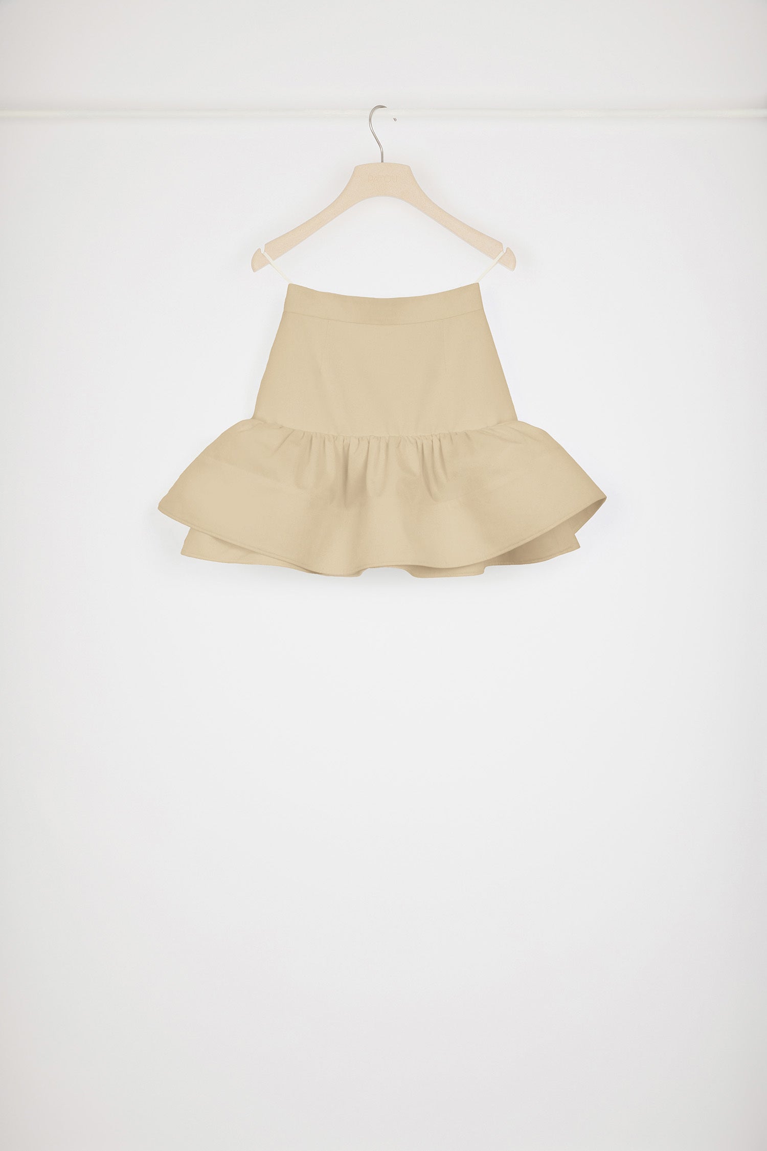 Patou - Ruffle mini skirt in cotton gabardine - Beige - A mini skirt with a major silhouette.Beige cotton gabardine skirt. High waist. Short length. Fit and flare silhouette with maxi ruffle at the hem. Zip fastening at the back. Darts at the front and back.