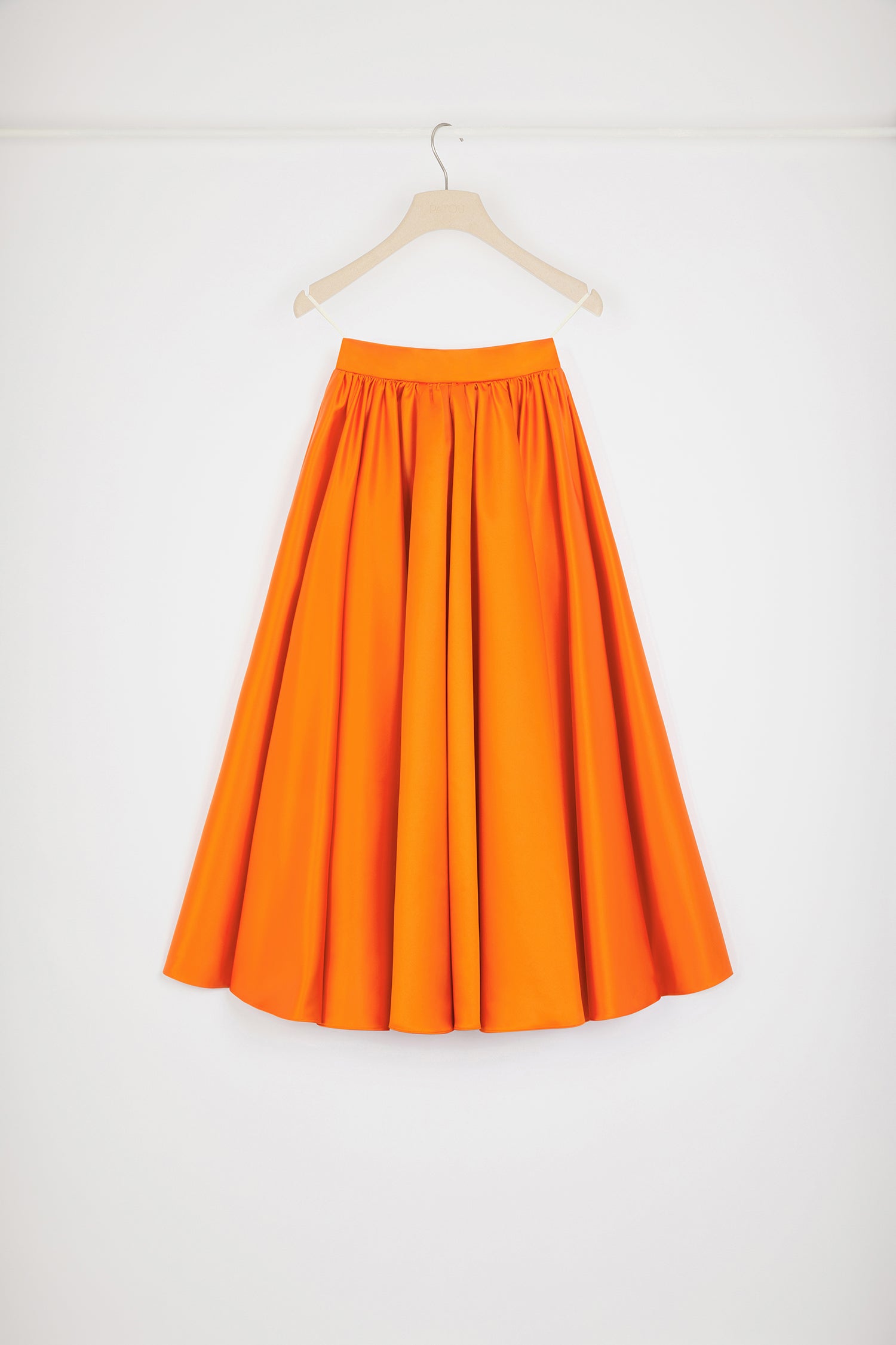 Patou - Volume midi skirt in satin - Bright Orange - A new skirt shape joins the Patou circle.Bright orange polyester duchesse satin skirt. High waist. Midi length. Full circle silhouette. Zip fastening at the back. Seam pockets.This is a full volume oversized style.