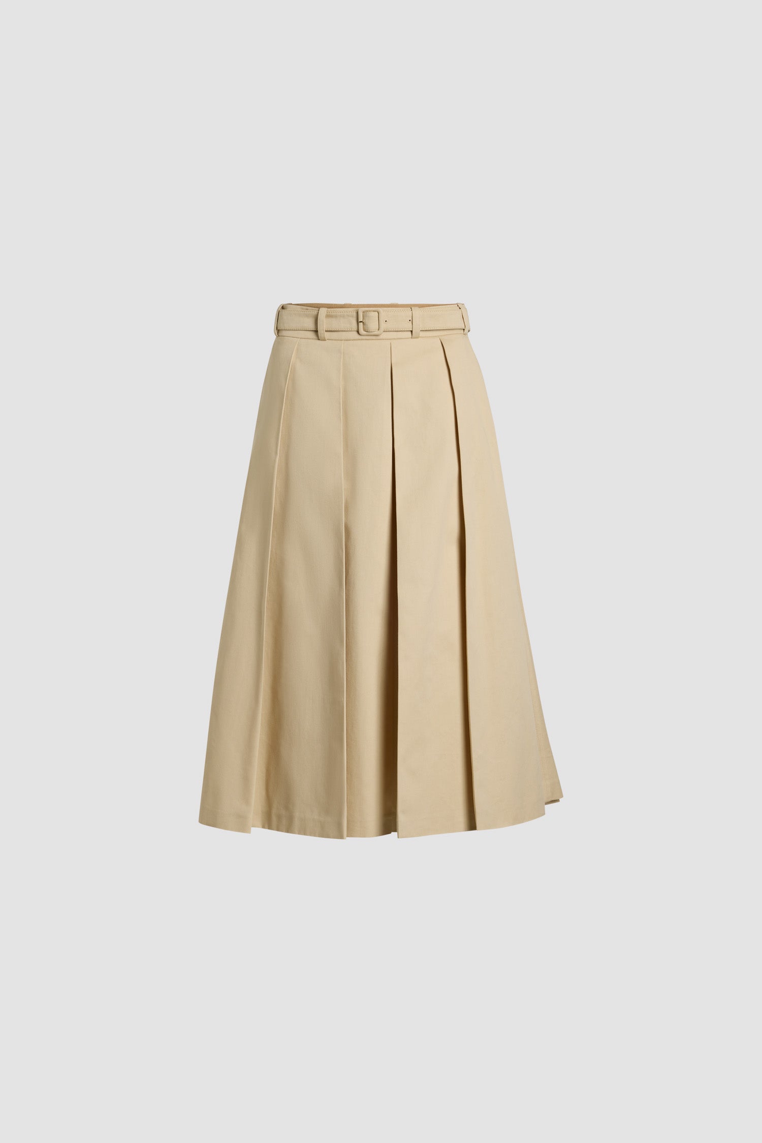 Patou - Jupe midi plissée en coton bio - Winter White - Jupe en gabardine de coton bio blanc d'hiver. Longueur midi. Plis larges. Ceinture à boucle amovible. Passants de ceinture. Poches latérales. Fermeture par zip au dos.