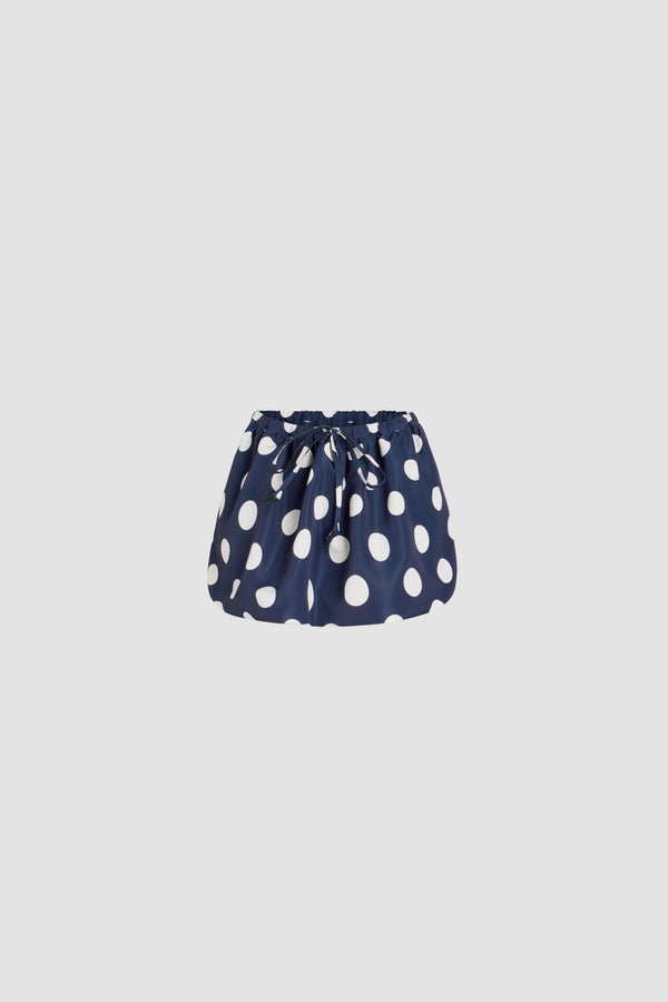 Patou - Jupe courte bouffante en ottoman imprimé recyclé - Navy Polka Dots - Jupe en ottoman recyclé. Imprimé pois. Modèle court. Taille élastiquée à coulisse en gros-grain. Poches latérales.