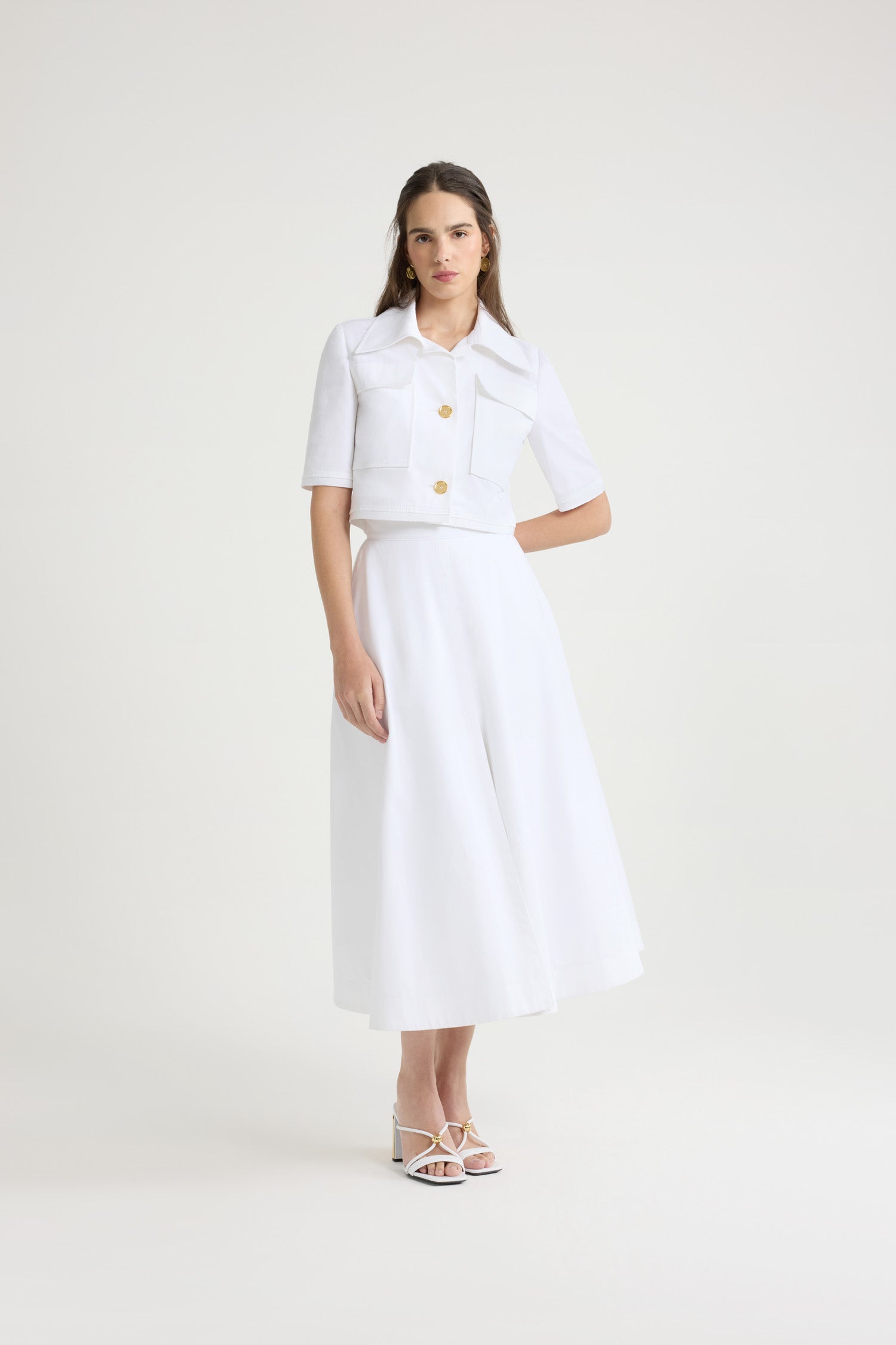 Patou - オーガニック コットン ギャバジン ロング Aラインスカート - White - ホワイトのオーガニックコットン ギャバジン製スカート。アンクル丈。ハイウエスト。ウエストバンドにパトゥのロゴ刺繍。サイドにポケット。