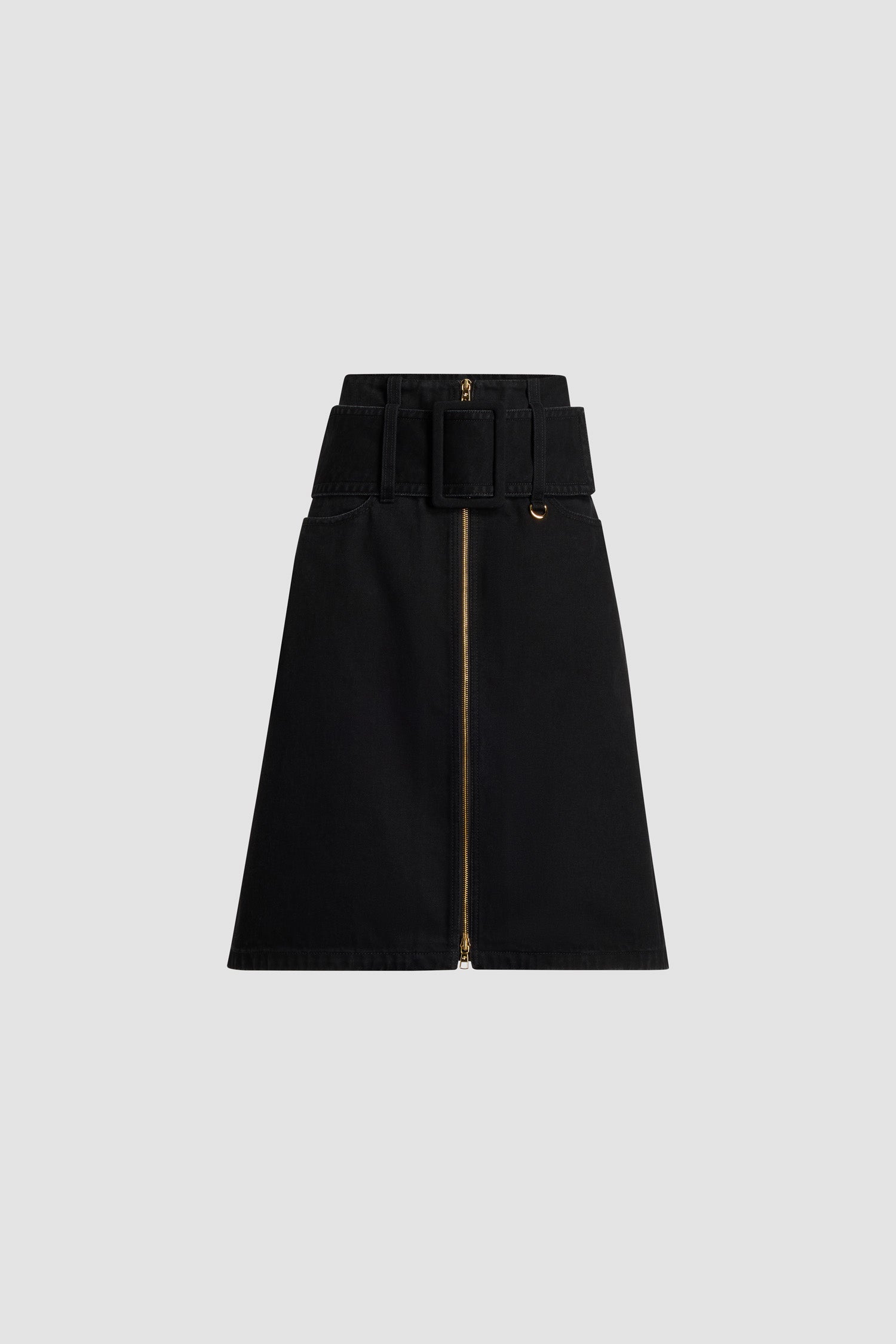 Patou - Zip front belted midi skirt in organic cotton denim - Khol Stone - Khol Stone black organic cotton denim skirt. Midi length. Low waist. Gold-tone two-way zip fastening at the front. Wide fabric belt at the hips with fabric-covered buckle and gold-tone D-ring. Low pockets at the front.