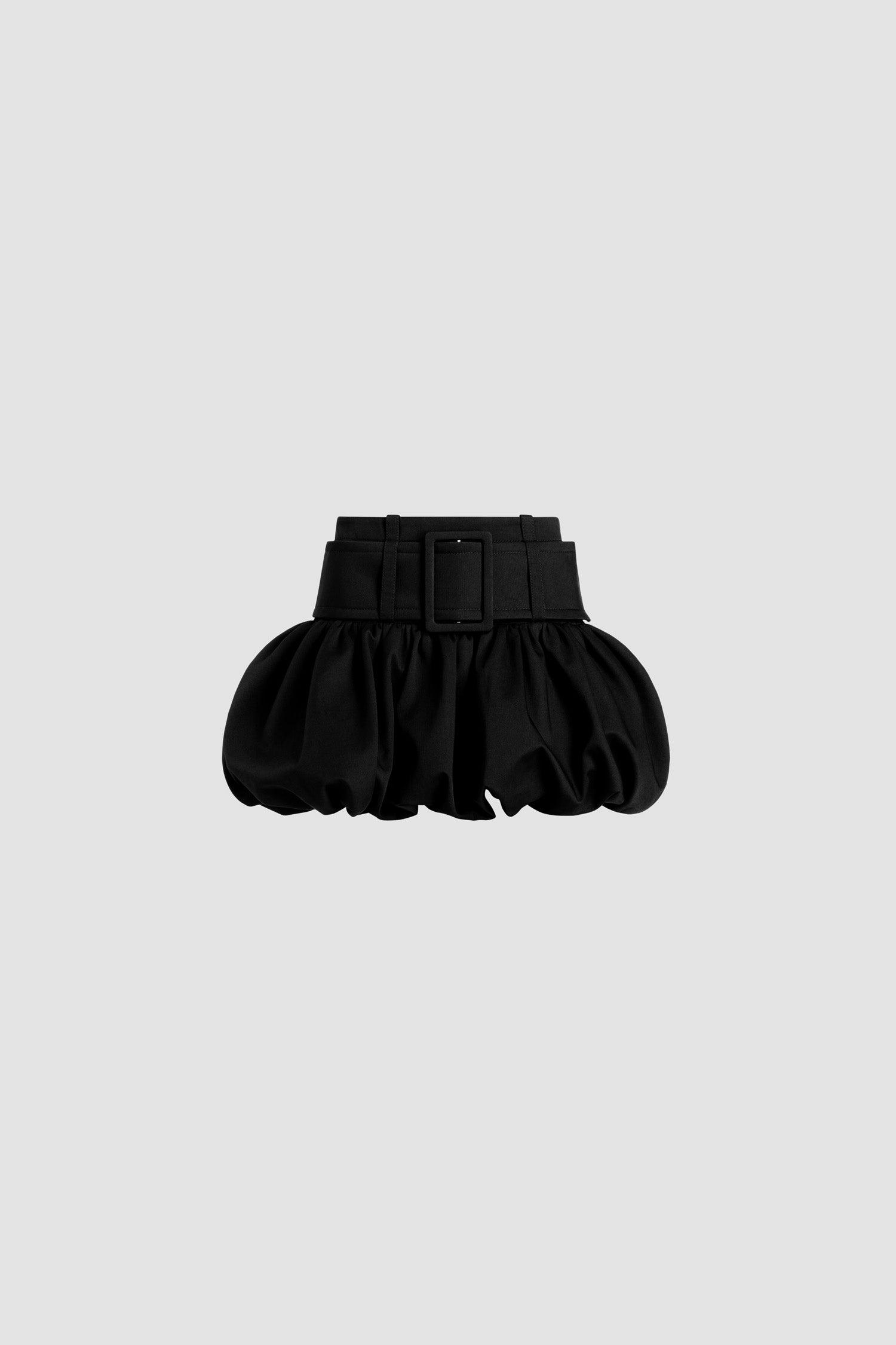 Patou - Belted bubble mini skirt in organic cotton gabardine - Black - Black organic cotton gabardine skirt. Short length. Low waist. High volume silhouette that can be puffed out. Wide fabric belt with fabric-covered buckle. Zip fastening at the back.