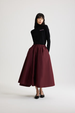 Asymmetrischer Midirock aus recycelter Faille