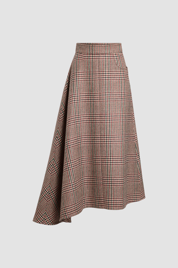Patou - Jupe midi asymétrique en flanelle de laine éco-responsable - Prince Of Wales - Jupe en flanelle de laine vierge éco-responsable. Motif prince-de-galles. Longueur midi. Taille mi-haute. Silhouette asymétrique avec plis d’un côté. Boutons-pression argentés gravés du monogramme JP sur le côté, fermeture par zip à l’arrière. Une poche latérale arrondie. Modèle doublé.