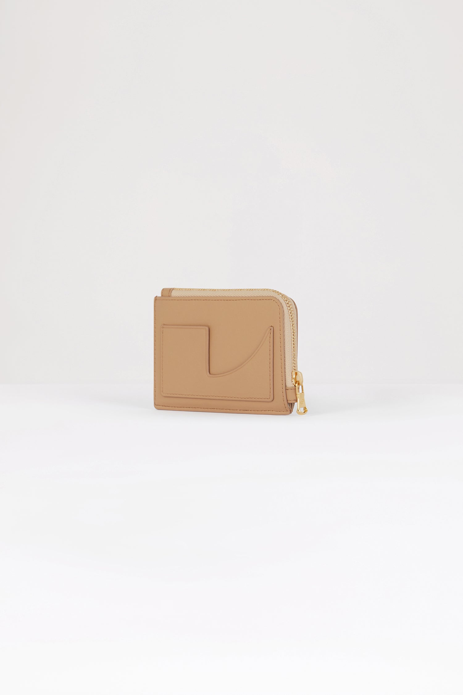 Patou - Patou coin cardholder in leather - Beige - The perfect Patou purse.Beige leather coin cardholder. Three card slots at the front, one cut-out card slot at the back. Zipped coin cardholder. Gold embossed Patou.