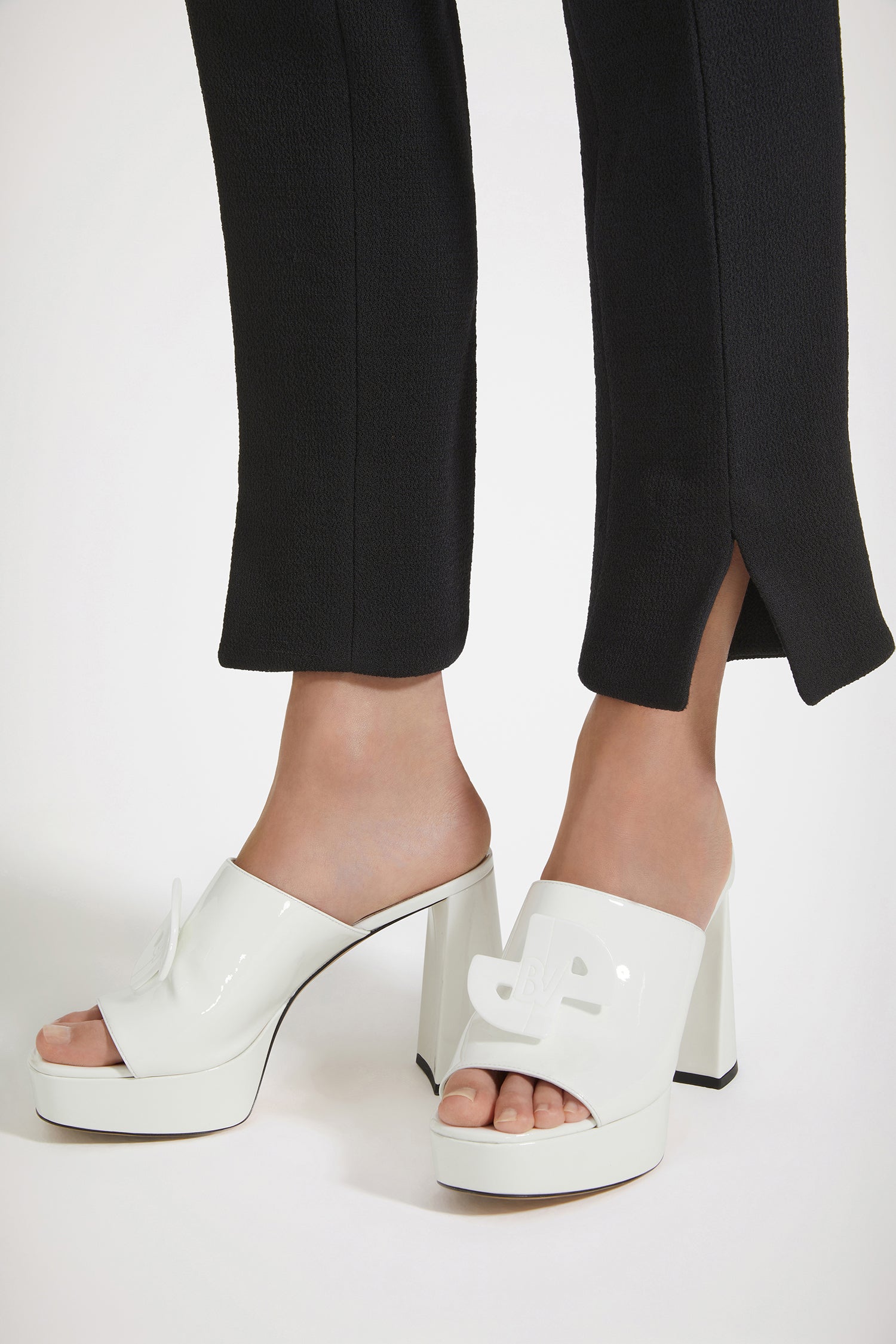 Patou - GLOSSY ANITA x Bettina Vermillon - White - A mule fit for a muse.White patent leather mules. From a special collaboration with Paris-based shoemaker Bettina Vermillon. Quilted upper with JPBV appliqué. 11 cm block heel.