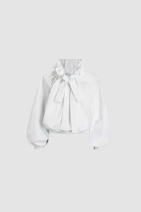 Patou - La Patou Blouse aus Bio-Baumwollpopeline - White - Top aus weißer Bio-Baumwoll-Popeline. Stark gebauschte Form. Kordelzug-Kragen mit Rüschung und Ripsband. Fledermausärmel mit elastischen Bundabschlüssen. Elastischer Taillenbund.