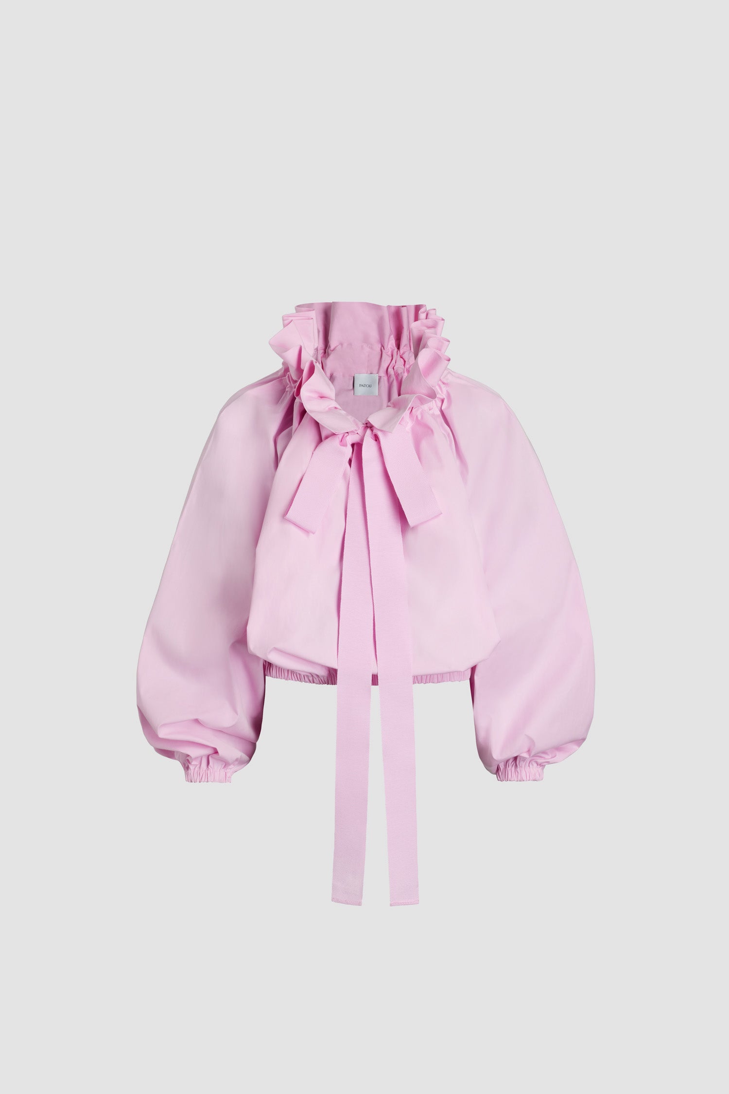 Patou - Iconic drawstring top in organic cotton - Rosebloom Pink - Rosebloom Pink organic cotton poplin top. High volume silhouette that can be worn knotted at the neck or off the shoulders. Drawstring collar with flounce at the front and long grosgrain ties. Batwing sleeves with elasticated cuffs. Elasticated waist.