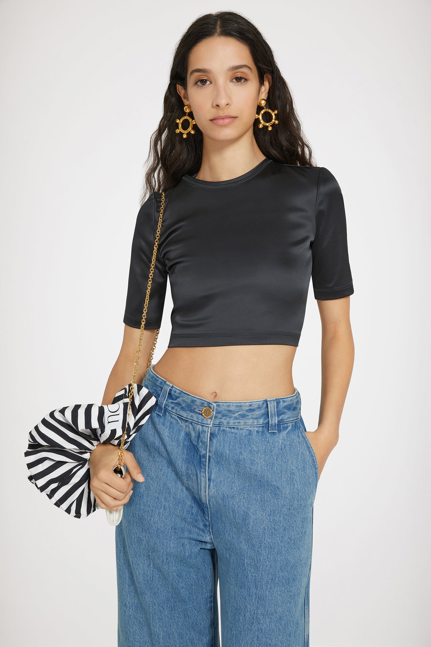 Patou - Open back top in satin - Black - Party at the back.Black satin top. Cropped length. Fitted silhouette. Round neck. Open back with twist detail. Ties that fasten at the back.This style is very fitted.