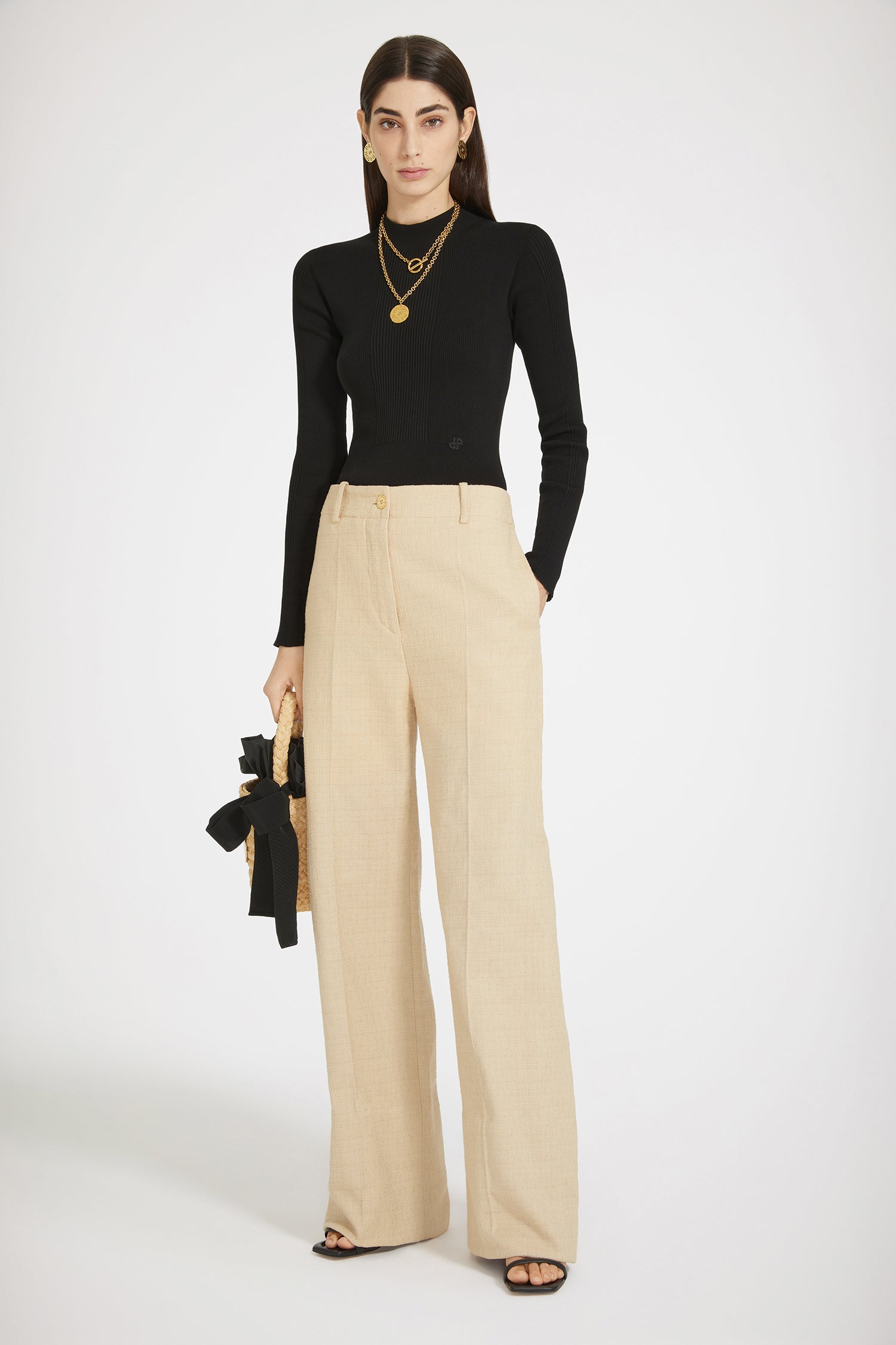 Patou - Iconic long trousers in cotton tweed - Beige - Flawless tailoring with a smile: a life in Patou.Beige cotton tweed trousers. Iconic Patou silhouette. Long straight fit. Fastens via a gold-tone JP-engraved button and concealed zip at the front. Belt loops, two pockets at the sides. Signature darts at the back.