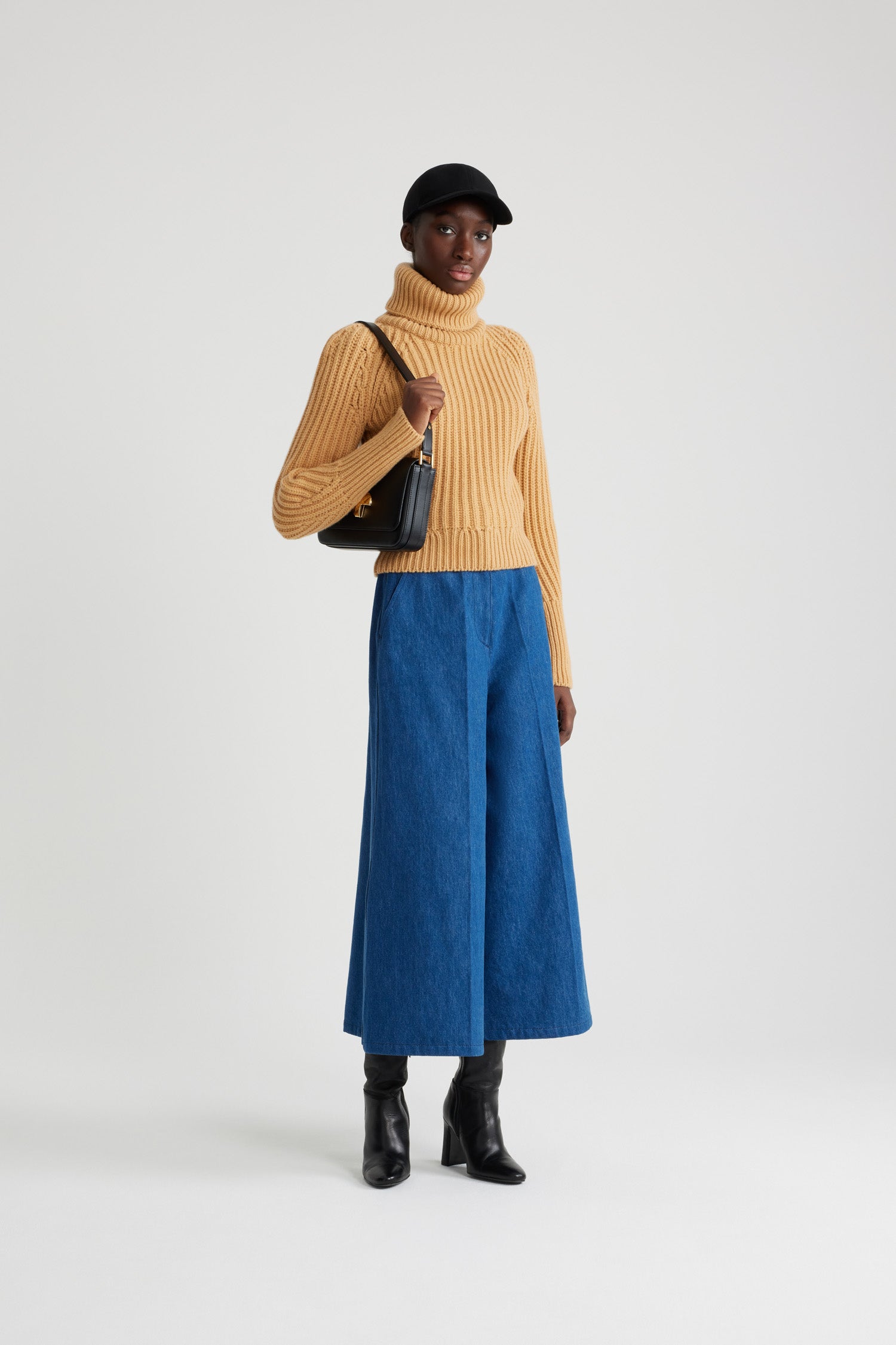 Patou - Wide-legged trousers in organic cotton denim - Stonewash - Stonewash organic cotton denim trousers. Wide leg. High waist. Fastens via a gold-tone Patou-engraved button and concealed zip at the front. Belt loops, two pockets at the sides. Stitched creases at the front.