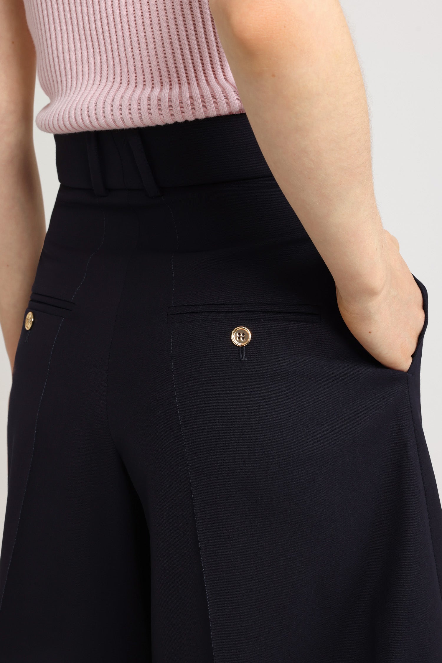 Patou - Bermudas in sustainable technical wool twill - Navy Black - Navy Black sustainable technical wool twill bermudas. High rise. Belt loops. Fastens via a gold-tone JP monogram-engraved button and concealed zip at the front. Pressed creases at the front and back. Pockets at the sides, buttoned jet pockets at the back.