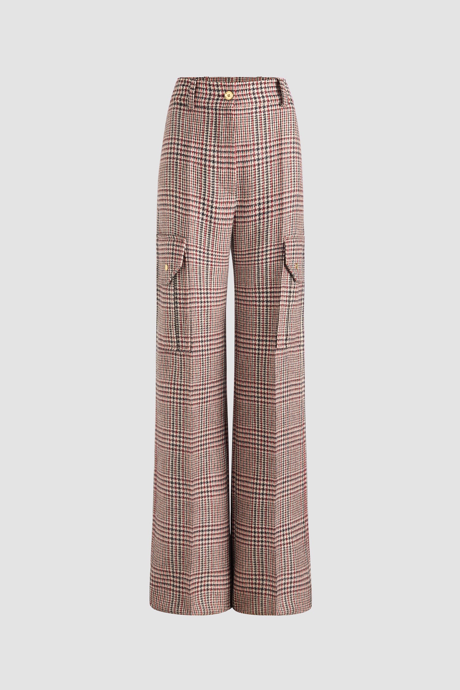 Patou - Flared cargo trousers in sustainable wool flannel - Prince Of Wales - Sustainable virgin wool flannel trousers. Prince of Wales pattern. Long flared leg. Gold-tone JP monogram-engraved button and concealed zip at the front. Belt loops. Pockets at the sides; cargo pockets on the legs with gold-tone JP monogram-engraved snap buttons. Stitched crease at the front and back.