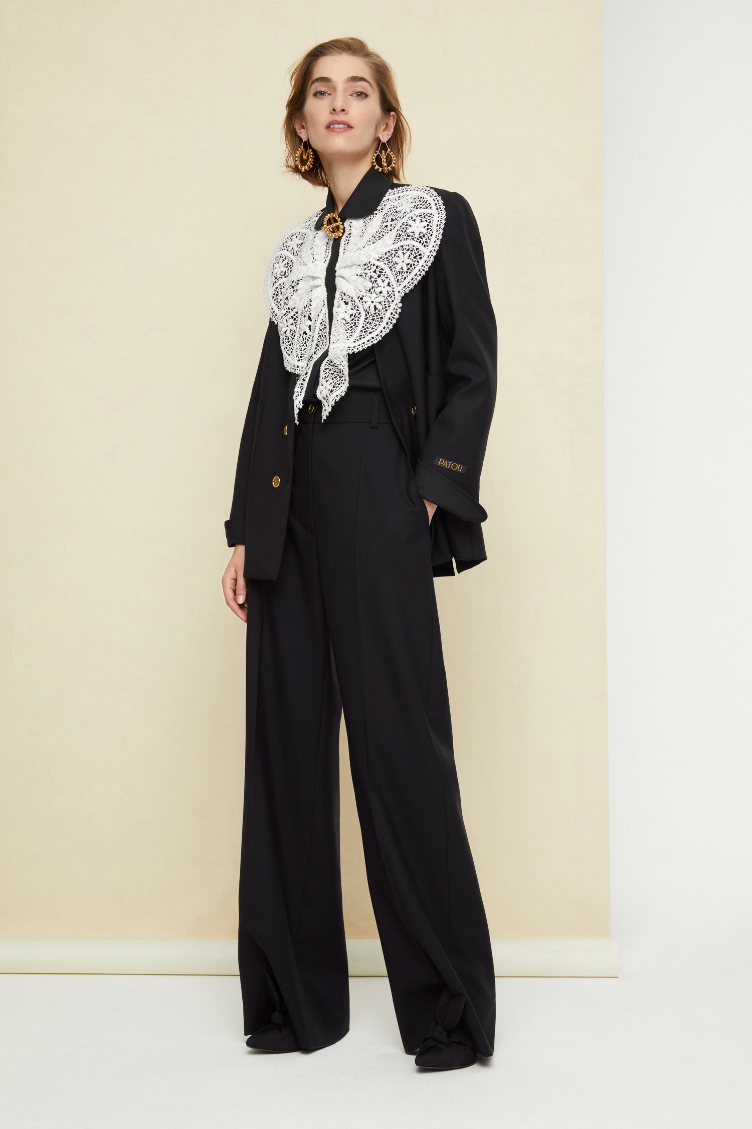 Patou - Lace bib shirt - Black - The sheer seduction of guipure lace.Black cotton poplin shirt with white floral lace bib at the front. Classic shirt collar and concealed button fastening. Buttoned cuffs. Brooch sold separately.