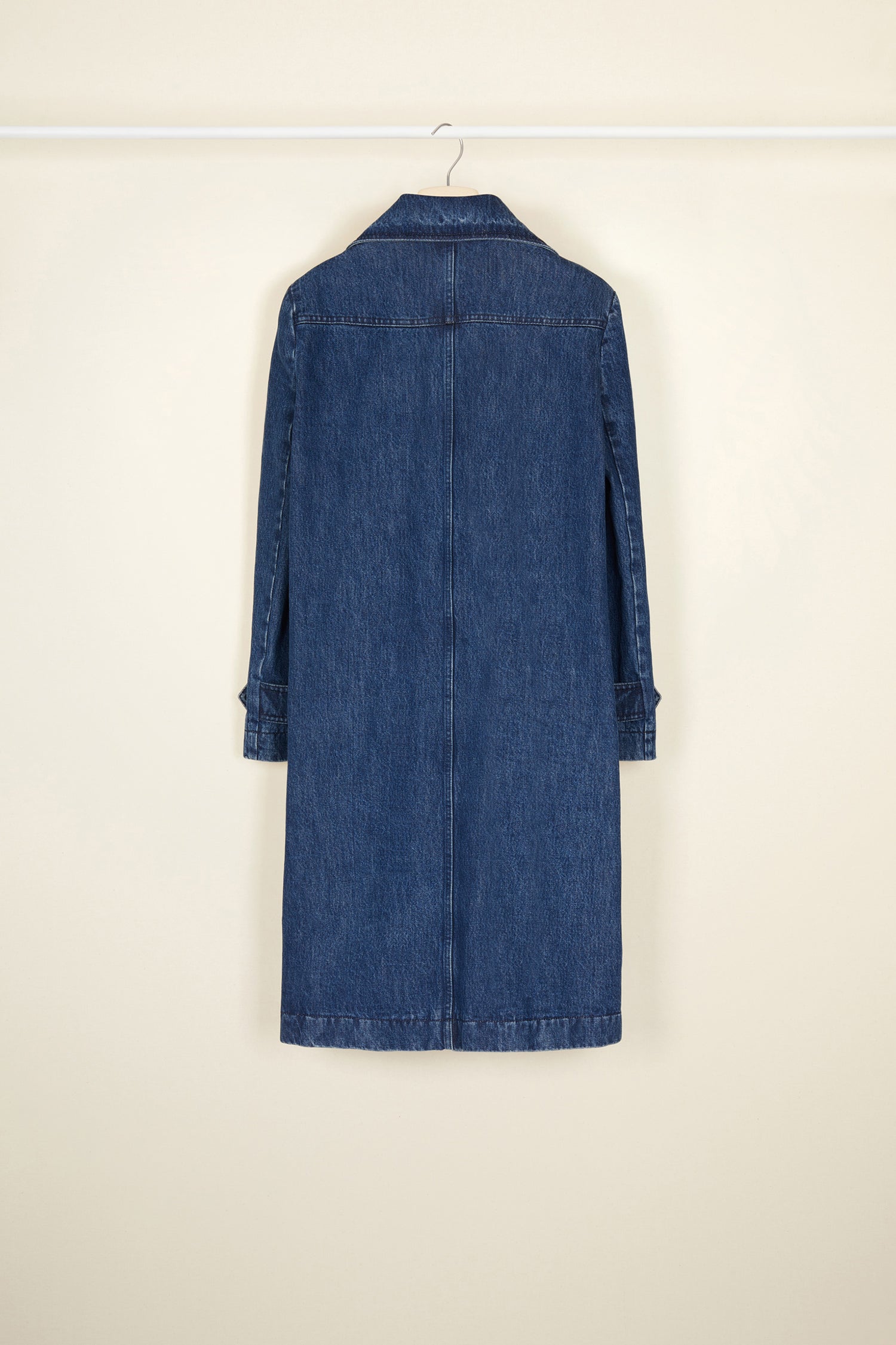 Patou - Denim overcoat - Indigo Blue - A fresher outlook on tailoring in classic denim.Classic overcoat crafted from recycled organic denim in indigo blue. Straight silhouette with an oversized collar and raglan sleeves. Button fastening down the front. Two side pockets. Button tab cuffs.
