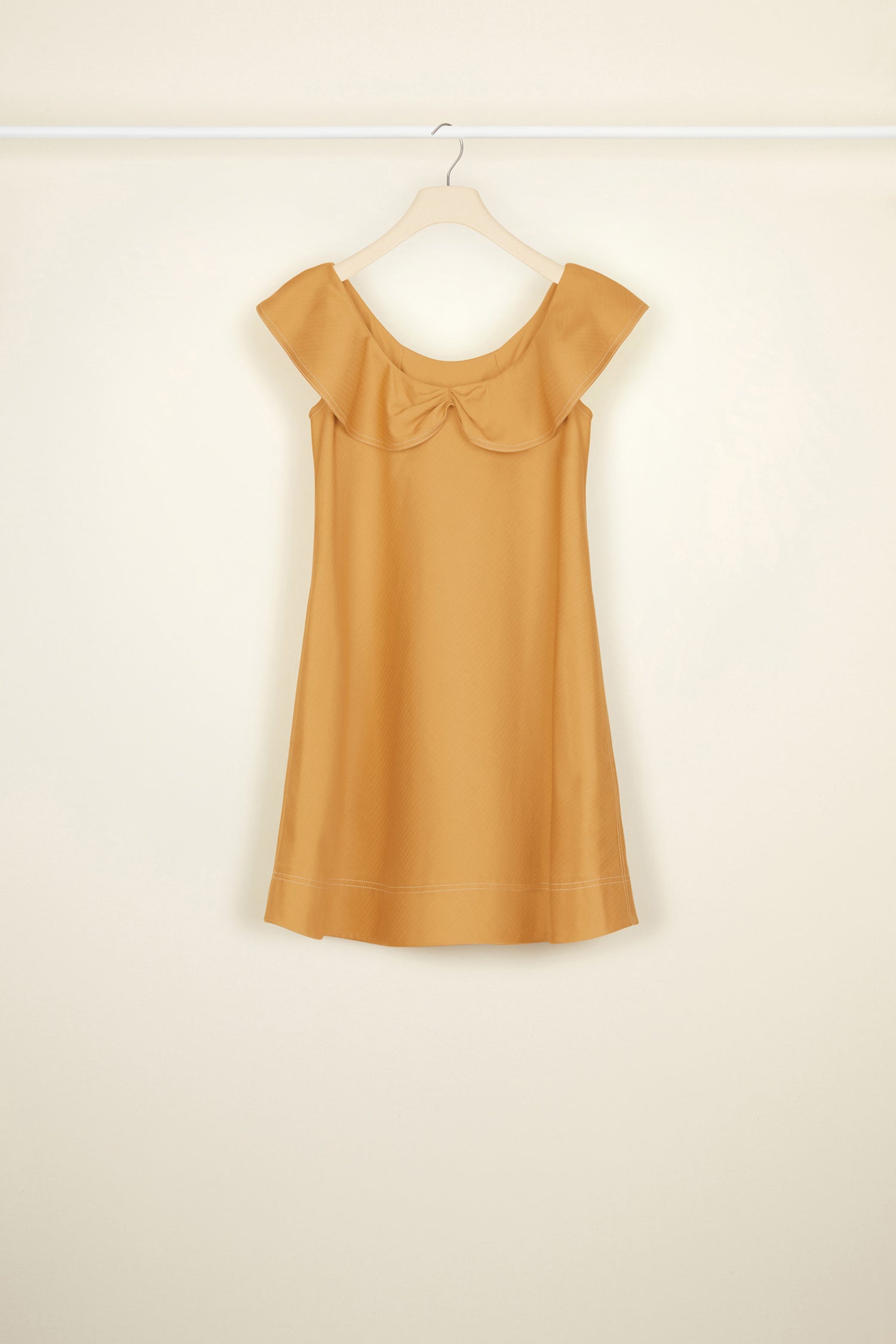 Patou - Frilly herringbone cotton minidress - Copper - The frills that lighten up heavy cotton.Copper-hued heavy herringbone cotton mini dress with contrasting white topstitching. Slight A-line silhouette. Sleeveless style with a frilly neckline. Ruching and loose panels at the front. Pockets at the sides. Concealed zip fastening.