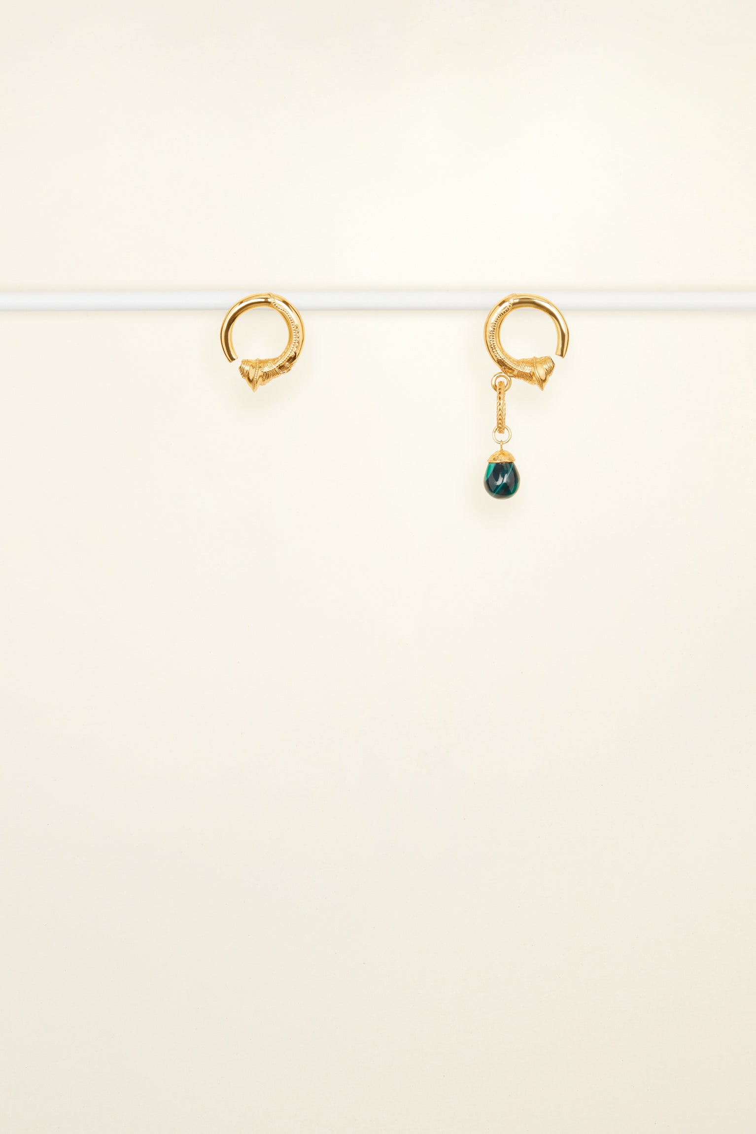 Patou - Asymmetrical brass and stone earrings - Gold Stones - Striking combinations, distinctive lines.Small brass hoop earrings. Asymmetrical design with a malachite stone on one side.