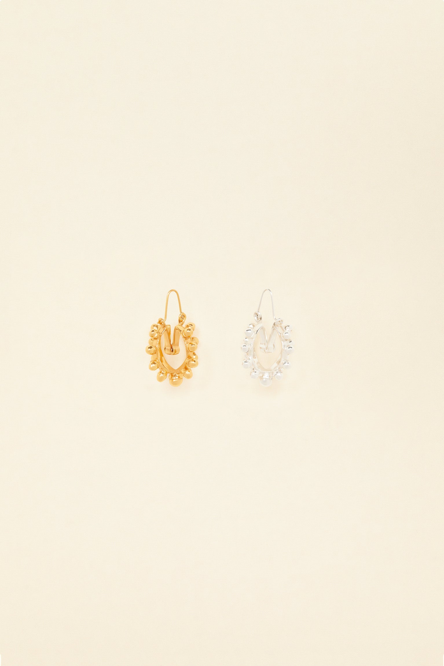 Patou - Two-tone pearl hoop earrings - Gold Silver - Gold and silver form a striking alliance. Brass hoop earrings with pearl-shaped embellishments all around. One in gold, one in silver.