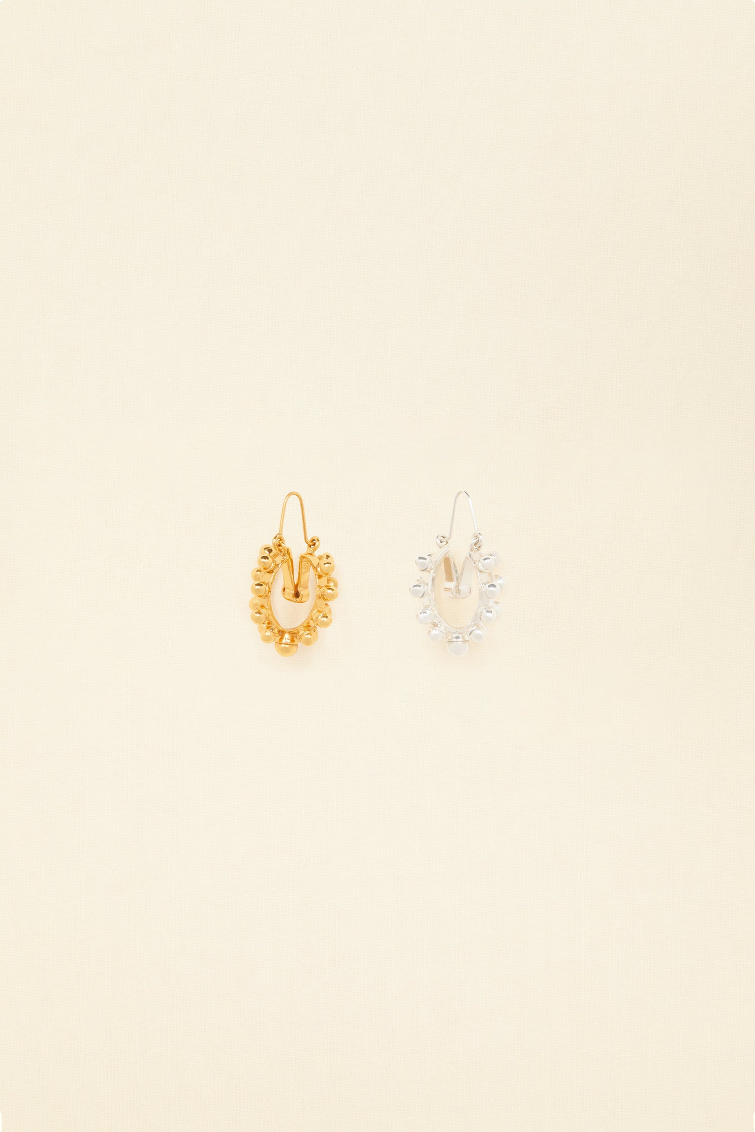 Patou - Two-tone pearl hoop earrings - Gold Silver - Gold and silver form a striking alliance. Brass hoop earrings with pearl-shaped embellishments all around. One in gold, one in silver.