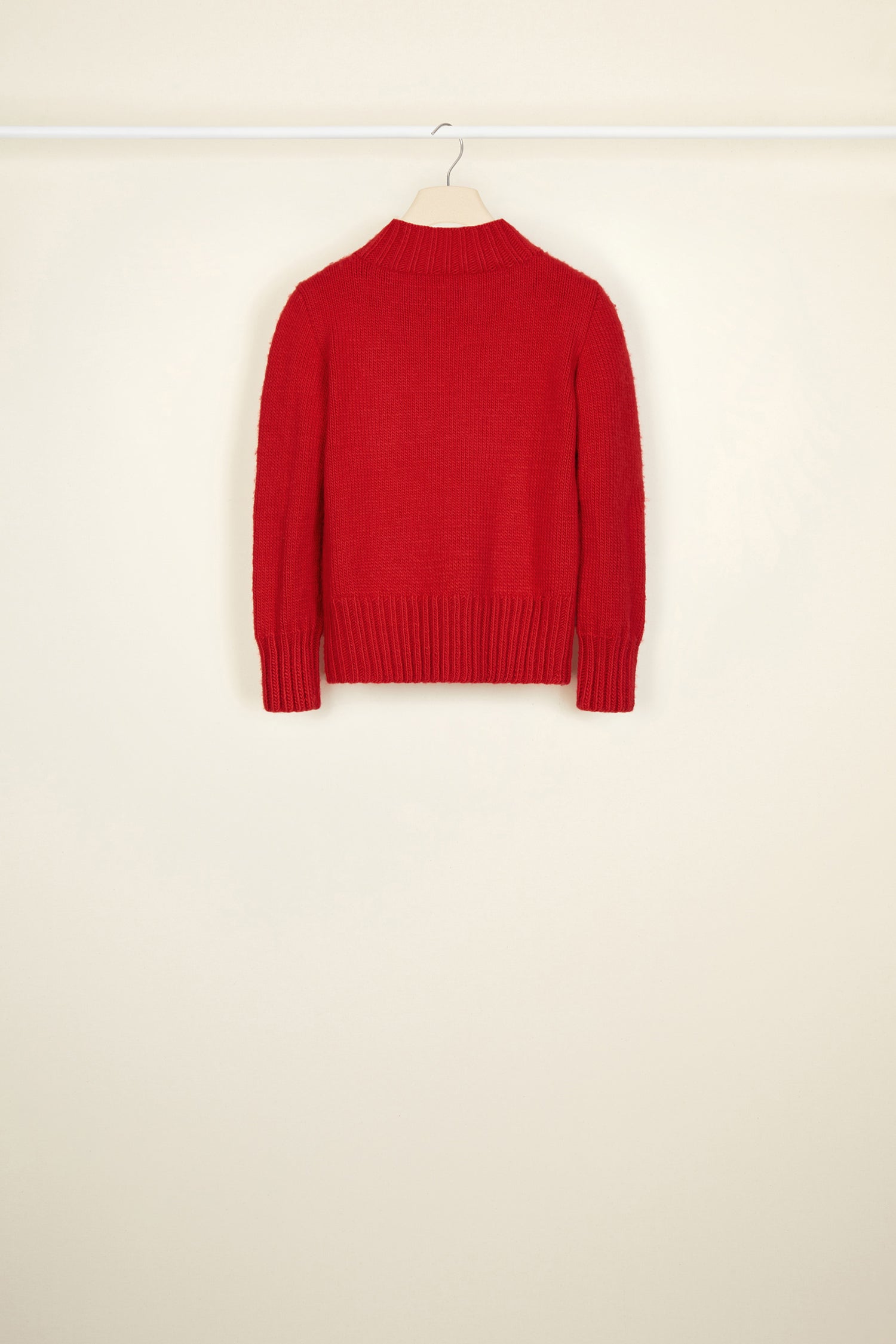 Patou - Cropped intarsia logo jumper - Poppy - A logo, a crest, a declaration of style.Poppy red wool jumper with intarsia logo on the chest in contrasting white. Cropped silhouette with a high neckline. Ribbed collar, cuffs and hem.