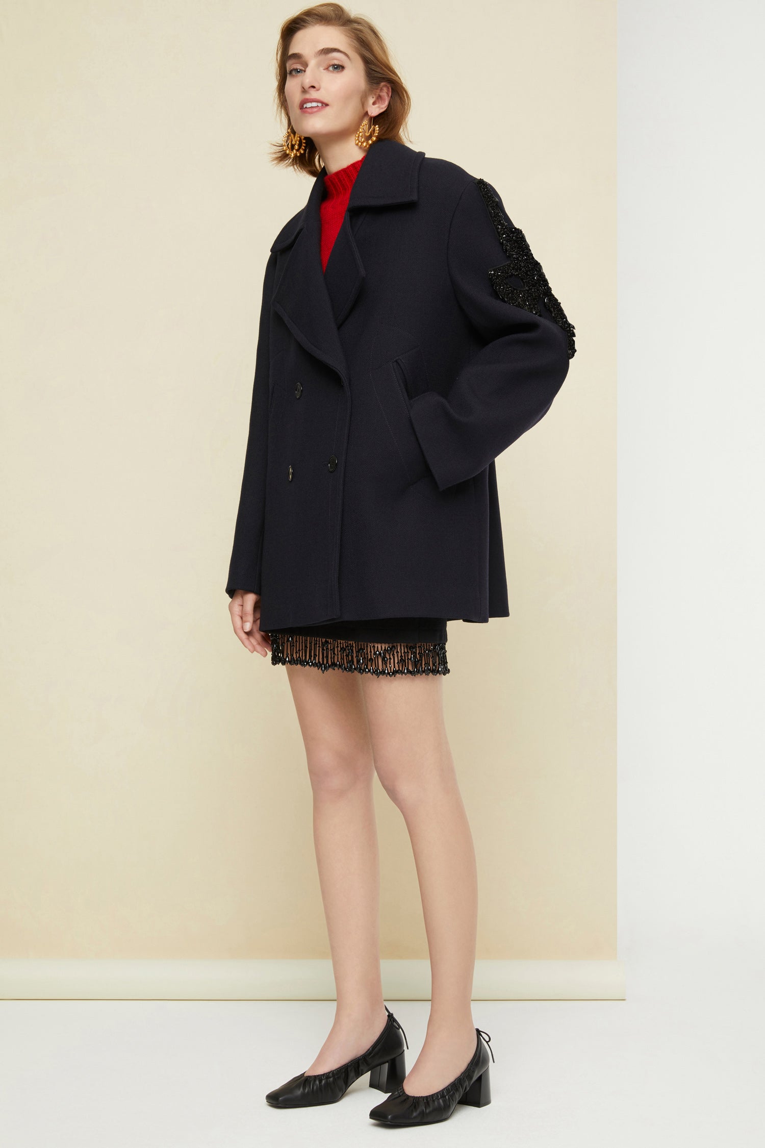 Patou - Pearl hem knit miniskirt - Black - Black pearls transform the hemline.Black extra-fine Merino wool miniskirt. Fitted style. Pearl fringing at the hem.