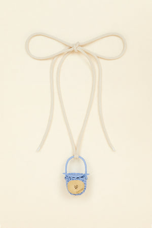 Bucket bag necklace in wicker