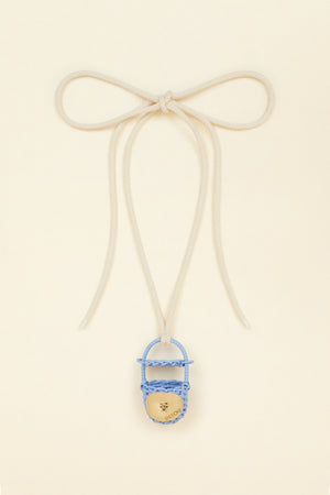 Bucket bag necklace in wicker