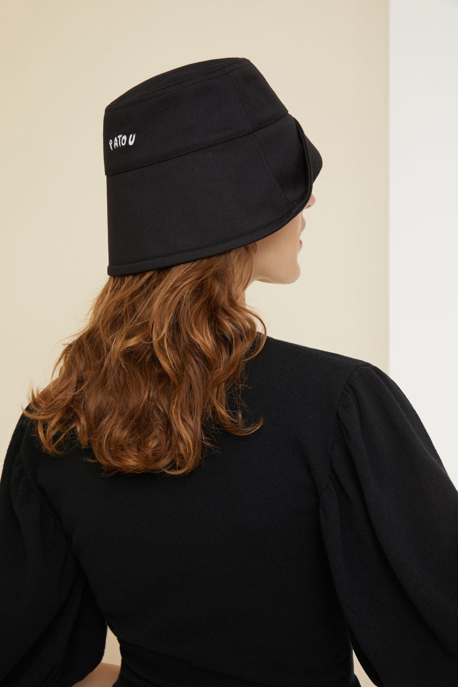 Patou - Barbamama bucket hat in organic cotton - Barbamama - Barbamama’s black as night.Black organic cotton bucket hat. Part of the Barbapatou capsule collection from a special collaboration with Barbapapa. Signature shape. Barbamama face embroidered at the front. Custom Patou logo embroidered at the back. Comes in two sizes. Standard women's size: XS/S. Standard men's size: M/L.