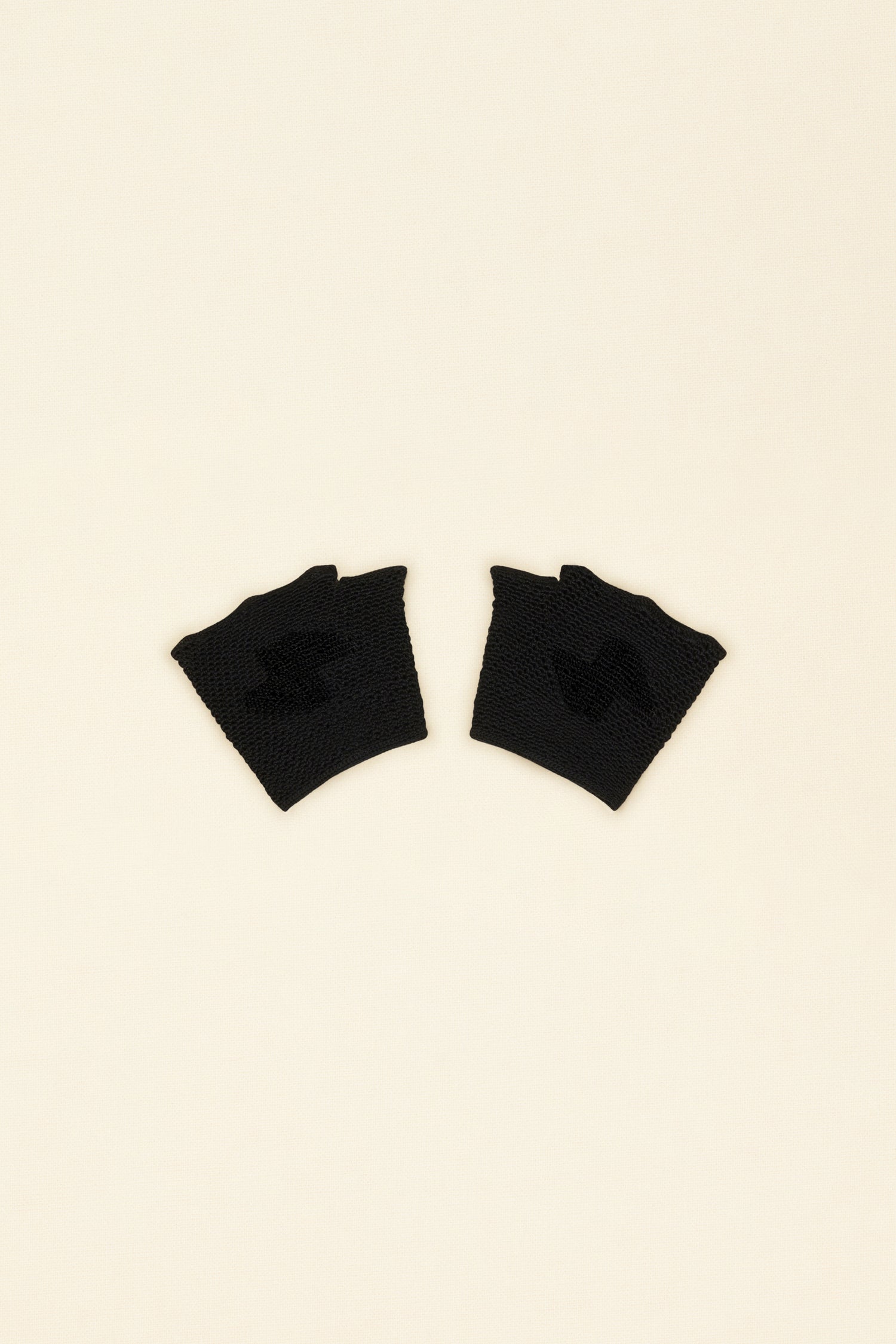 Patou - JP fingerless gloves in organic cotton - Black - Fingerless and fanciful, the Patou gloves are oh-so-wonderful!Black organic cotton fingerless gloves. Openwork detailing all over. JP monogram embroidered across the top. Crochet button.