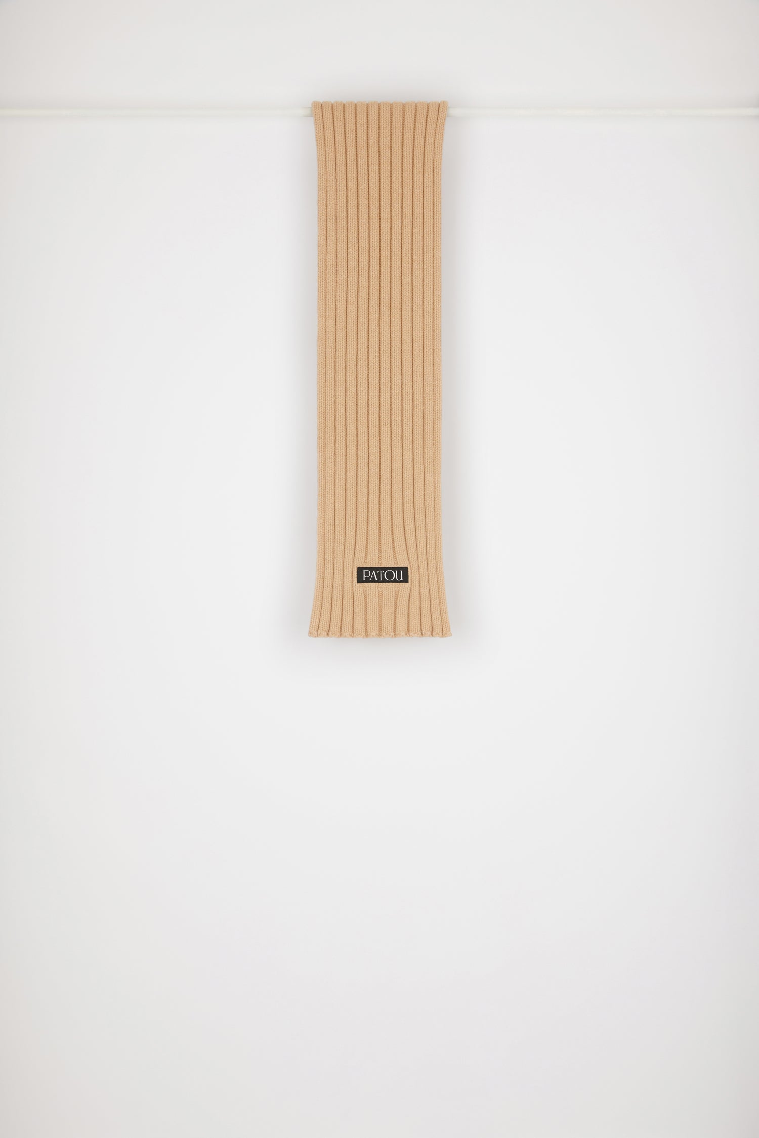 Patou - Ribbed wool scarf - Biscuit - Ready to take on the cold with a smile and a Patou scarf!Biscuit beige wool scarf. Thick ribbing. Black Patou label.