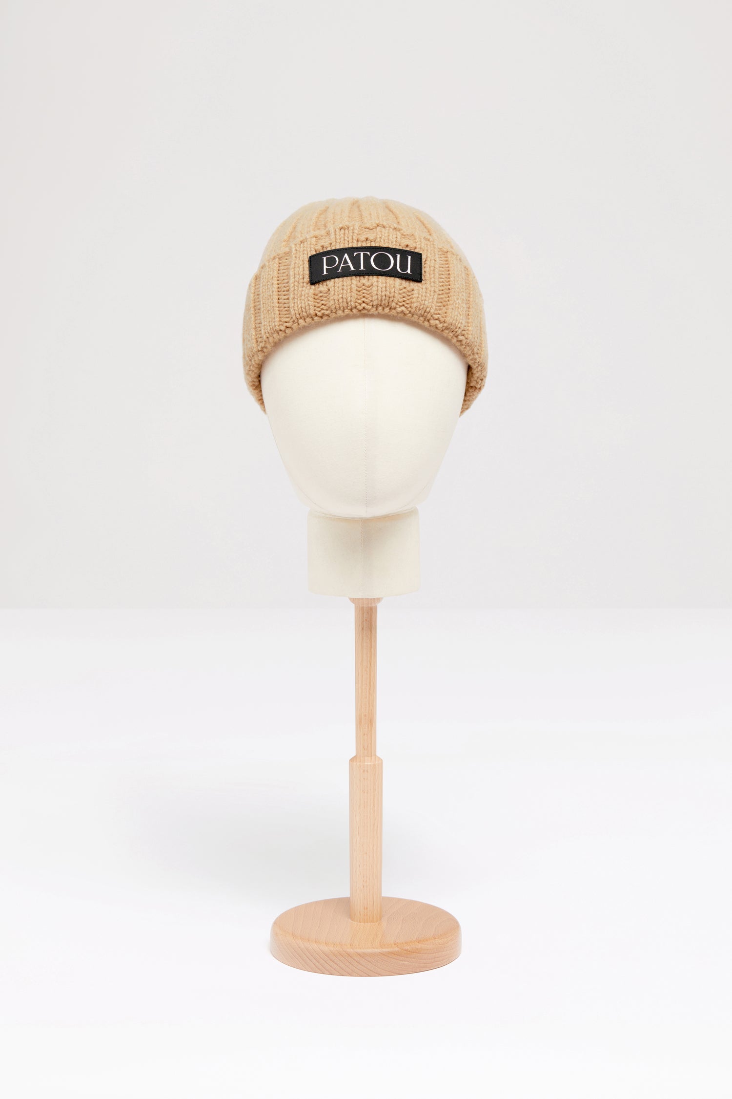 Patou - Ribbed wool beanie - Biscuit - This winter warmer is a real Patou winner. Biscuit beige wool beanie. Thick ribbing. Turn-up hem. Black Patou label.