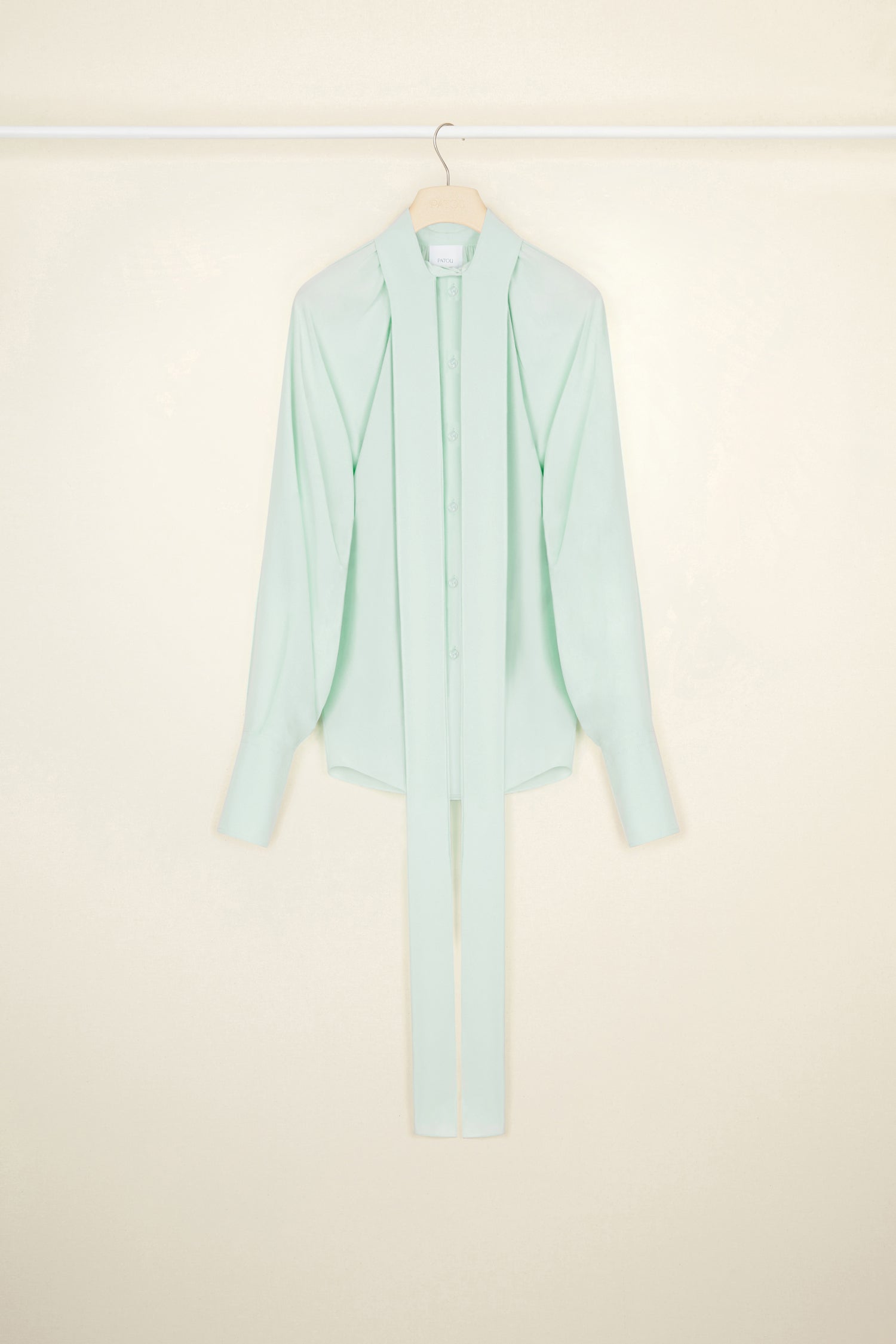 Patou - Silk lavallière blouse - Water Green - Daily glow, wrapped in a Patou bow. Green Waterfall silk crepe blouse. Lavallière collar with long ties at the front. Pleating at the front and back to create draping, Button fastening with JP engraved buttons. Buttoned cuffs.