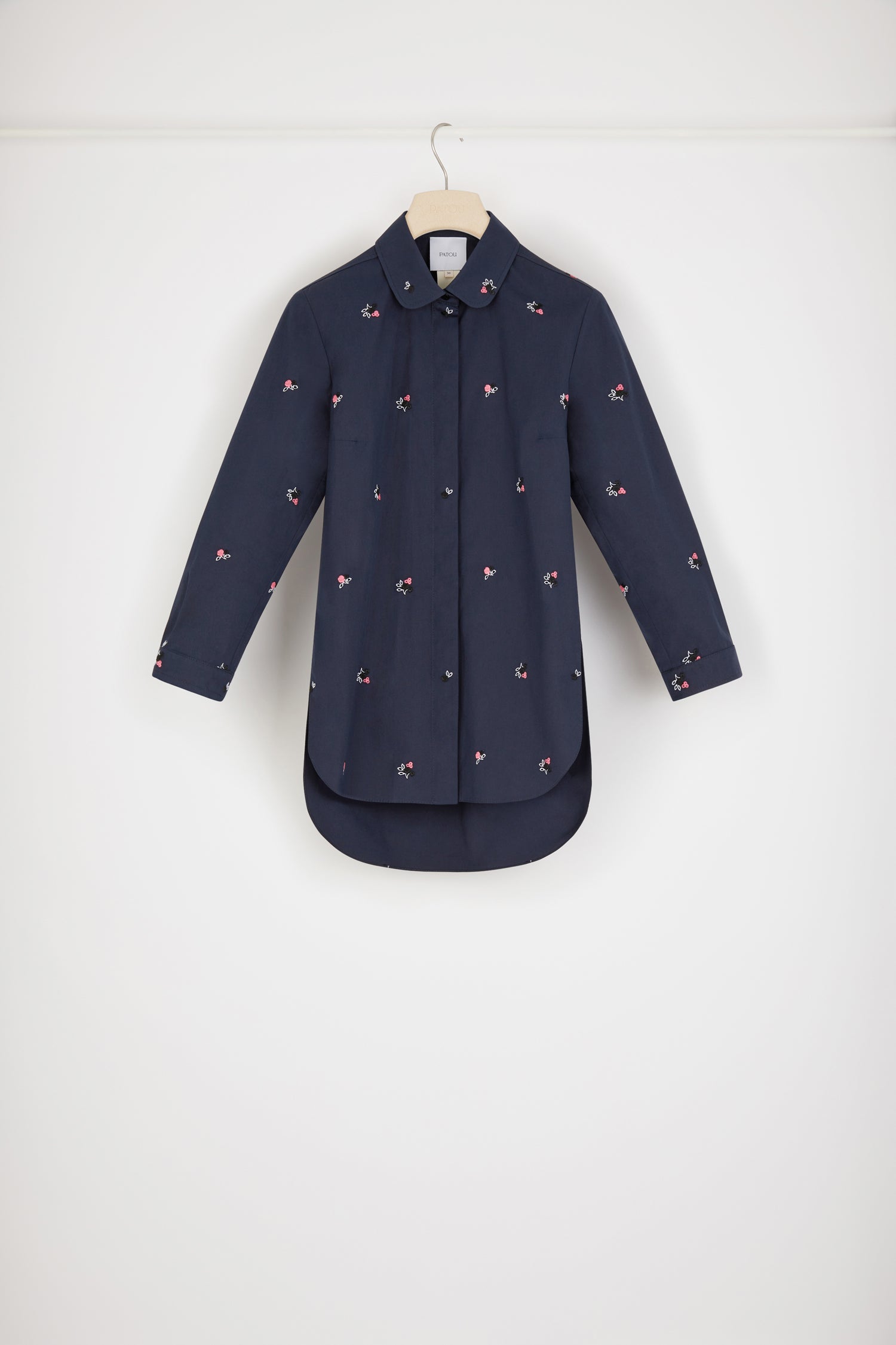 Patou - Embroidered baby shirt in organic cotton - Parisian Night - Tweaked and twee, the shirt speaks the new Patou vocabulary.Parisian Night navy organic cotton shirt. Allover floral embroideries. Peter Pan collar. Concealed button fastening. Slightly cropped sleeves. Buttoned cuffs. Split sides. Curved hem.