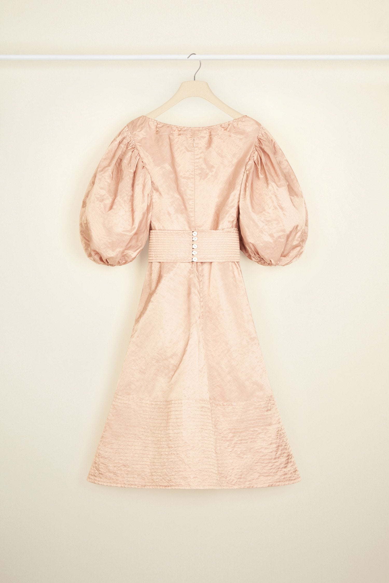 Patou - Cocktail dress in metal satin - Powdery Pink - Metal satin makes a Patou debut, with an effortless charm that is so very you.Powdery pink knee length dress. Metal satin with a natural rumpled look. Elasticated neckline that can be worn off the shoulders. Puff sleeves with elasticated cuffs. Removable wide belt with button fastening. Overstitched detailing on the belt and skirt. Pockets at the sides.