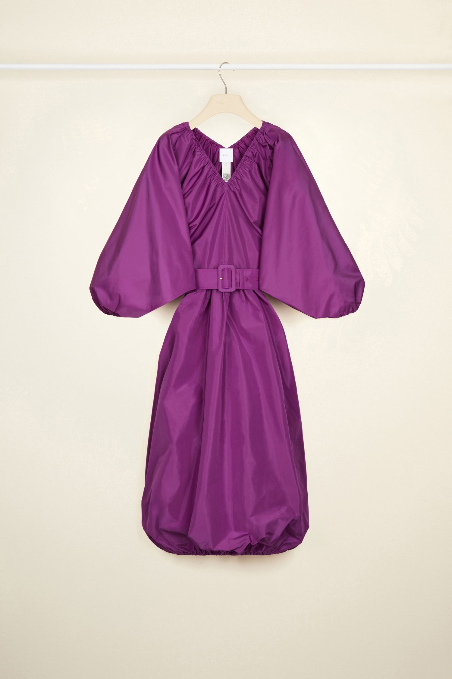 Patou - Belted maxi dress in eco-friendly faille - Anemone - Much volume and a zest of couture, a recipe for a Patou cocktail sensation.Anemone purple dress in eco-friendly faille. Maxi length. Elasticated V neckline. Volume sleeves with elasticated cuffs. Wide fabric belt with buckle fastening at the waist. Elasticated hem.