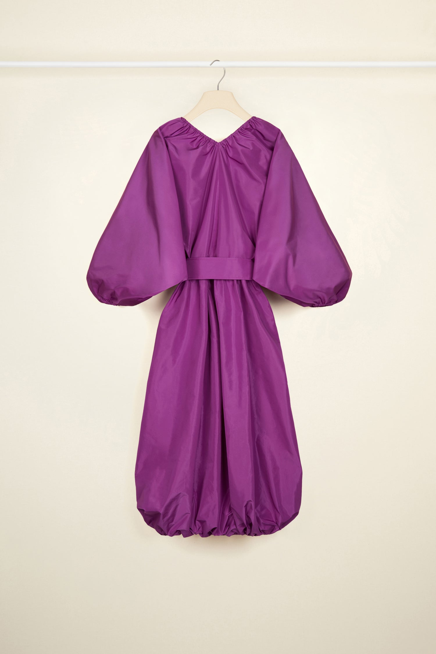Patou - Belted maxi dress in eco-friendly faille - Anemone - Much volume and a zest of couture, a recipe for a Patou cocktail sensation.Anemone purple dress in eco-friendly faille. Maxi length. Elasticated V neckline. Volume sleeves with elasticated cuffs. Wide fabric belt with buckle fastening at the waist. Elasticated hem.