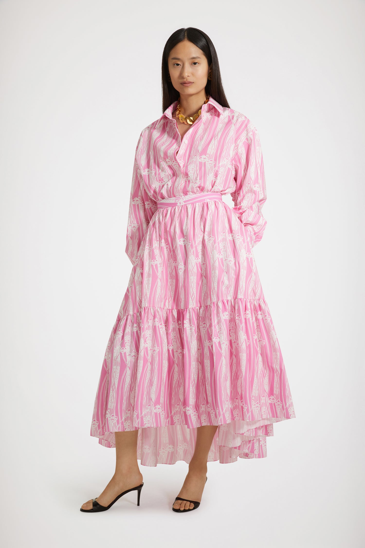 Patou - Mini shirt dress in printed organic cotton - Art Deco Pink - Layered or on its own, a new shape to make your own.Pink organic cotton poplin shirt dress. Seasonal Art Deco print. Short length. Loose silhouette. Shirt collar. Concealed button fastening with JP-engraved buttons. Patou logo embroidered at the front. Signature curved seam at the back. Buttoned cuffs.Loose fit (select one size down for a fitted look).