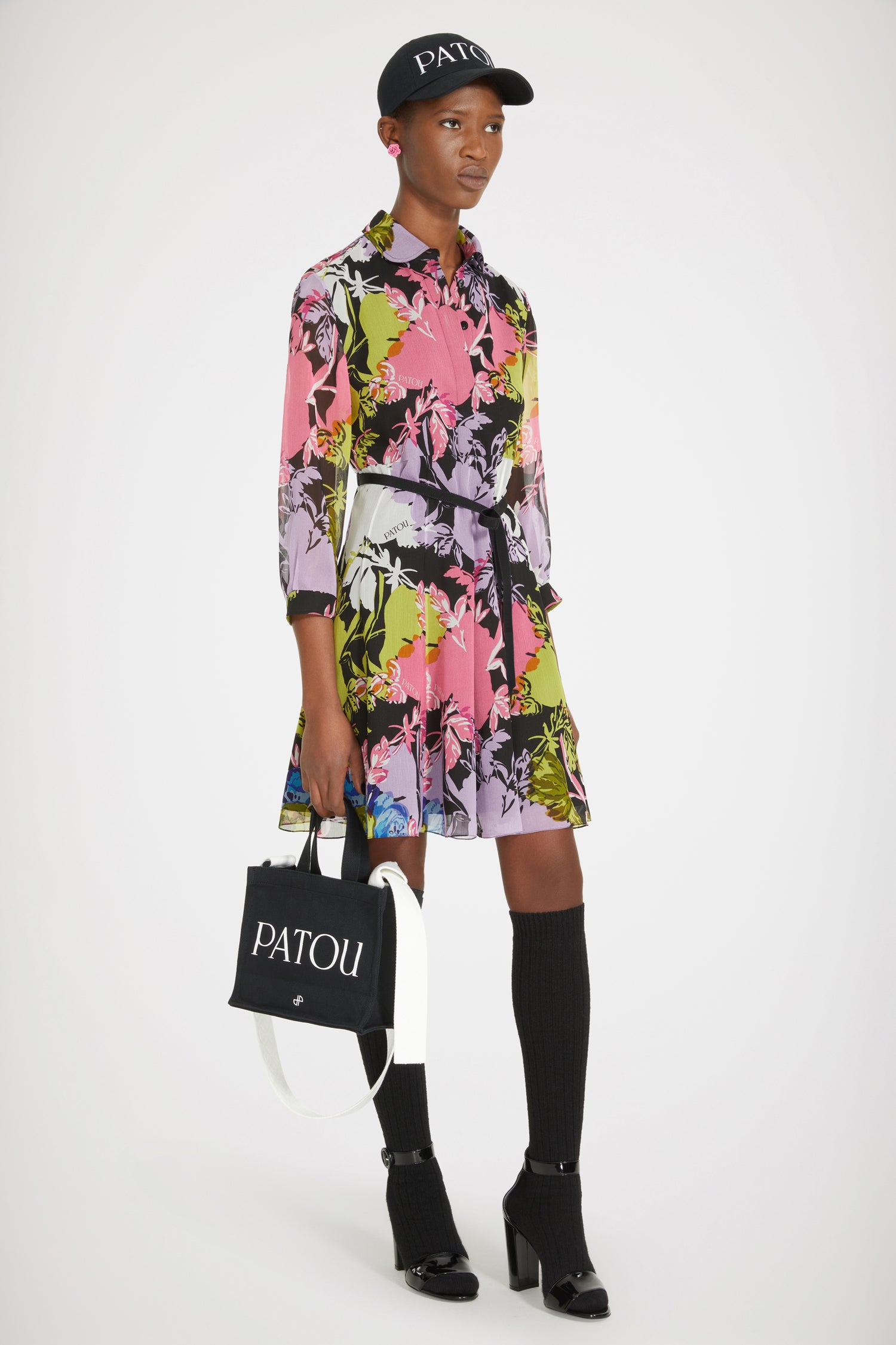 Patou - Floral skater dress in silk muslin - Absinthe Garden - Experience the exhilarating scent of Patou's Absinthe Garden! Floral silk muslin dress featuring the seasonal "Absinthe Garden" print. Patou logo all over. Peter Pan collar. Concealed button fastening. Slightly cropped sleeves. Buttoned cuffs. Thin fabric belt at the waist. Pleated skirt.