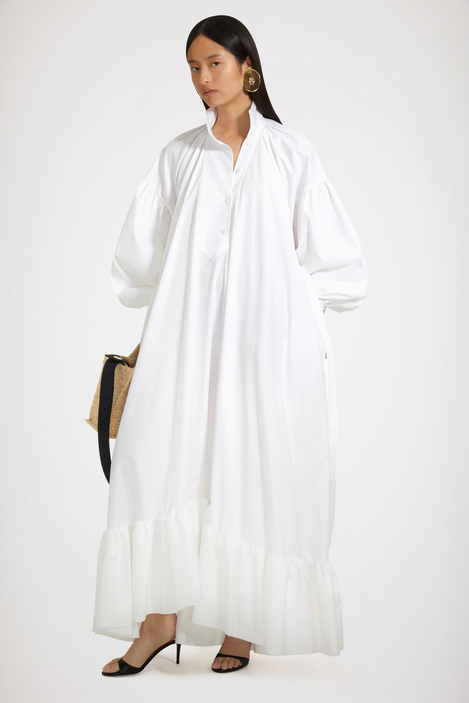 Patou - Maxi tiered dress in organic cotton - White - Enchanting volumes are Patou's love language.White organic cotton poplin dress. Maxi length. Tiered construction. Asymmetric silhouette that is longer at the back. High neck with off-centre button fastening at the front. Ruching at the collar to create pleating at the bodice. High-volume sleeves with dropped shoulders and wide buttoned cuffs. Belt at the waist. Pockets at the sides.This cut is oversized but we advise you to take your usual size.