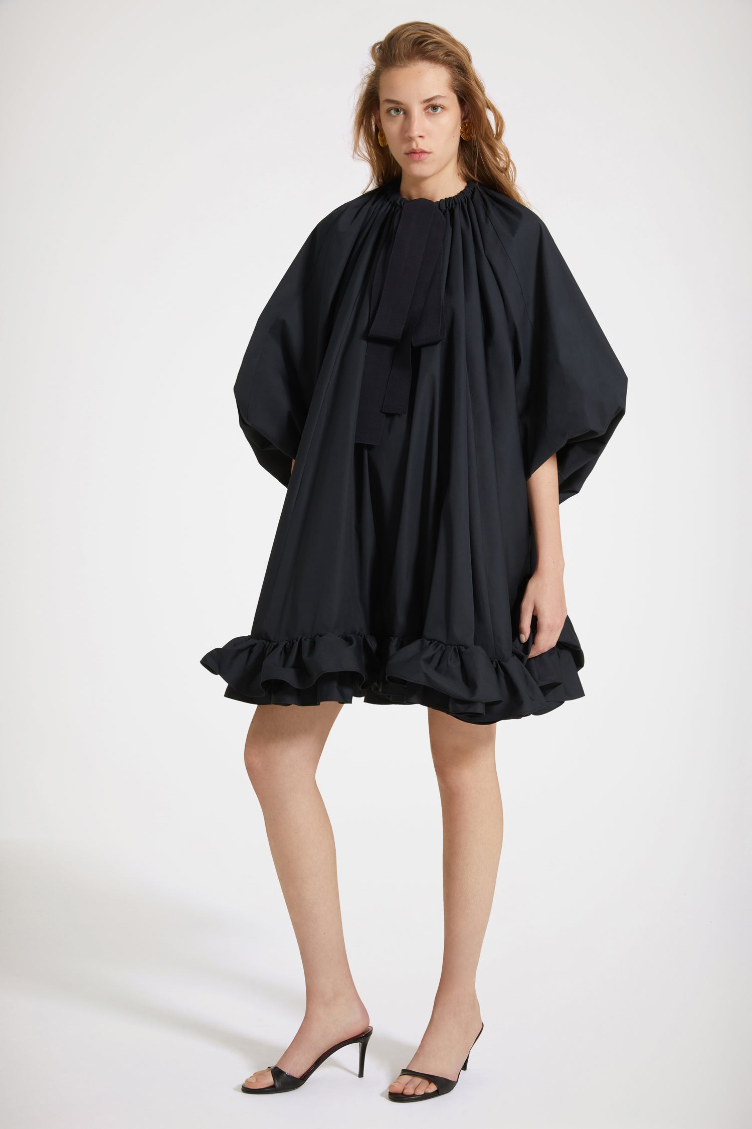 Patou - Grosgrain ruffle hem dress in organic cotton - Total Eclipse - Grosgrain and ruffles paint the perfect Patou picture.Total Ecllipse black organic cotton dress. Elasticated neckline with grosgrain drawstring that can be worn off the shoulders. Balloon sleeves with elasticated cuffs. Double ruffle at the hem.Loose fit (select one size down for a fitted look).