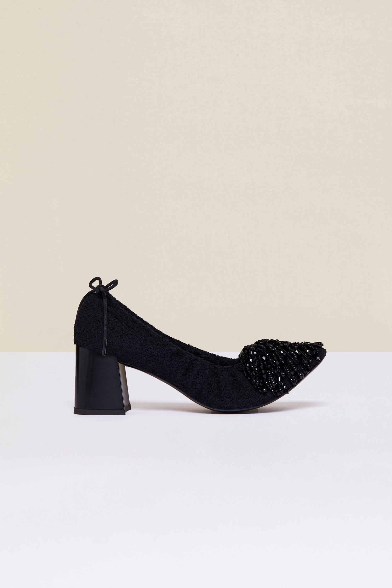 Patou - Pearl-embellished tweed pumps - Black - Summer tweed with a side of pearls.Drawstring pumps crafted from black cotton tweed. Black pearl pompom embellishment. Square toe. Black ties that fasten at the back. Block heel.