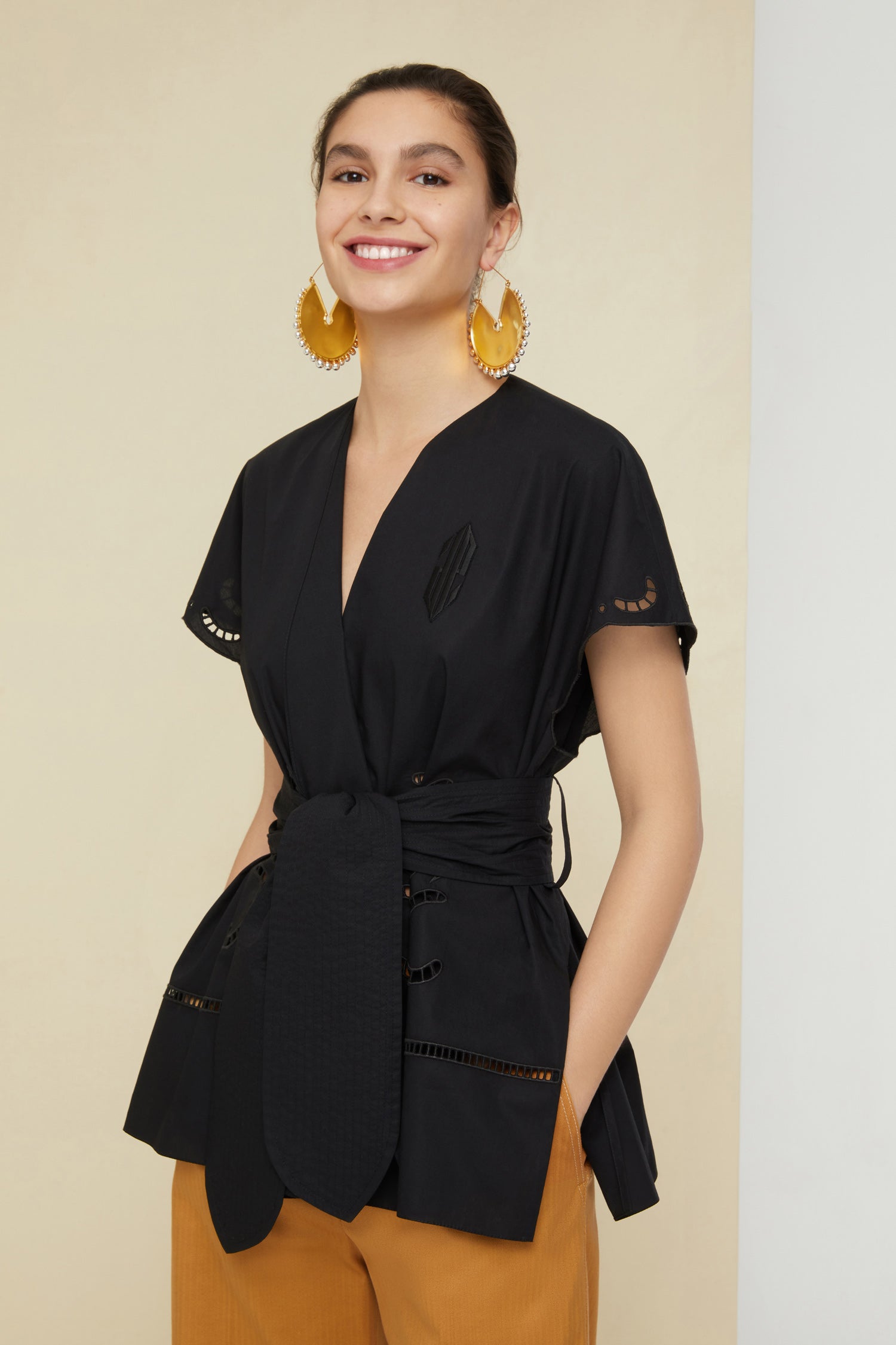 Patou - Openwork poplin top - Black - Architectures in summertime cotton.Black organic cotton poplin top. Mock wrap silhouette with wide belt at the waist. Openwork detailing all over with stylised JP logo embroidered across the chest. Split sides.