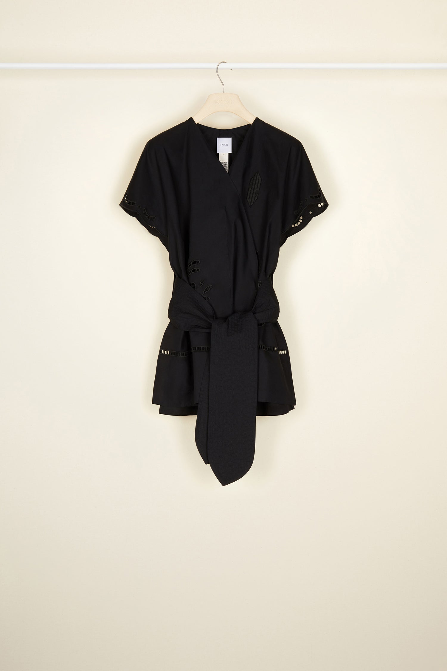 Patou - Openwork poplin top - Black - Architectures in summertime cotton.Black organic cotton poplin top. Mock wrap silhouette with wide belt at the waist. Openwork detailing all over with stylised JP logo embroidered across the chest. Split sides.