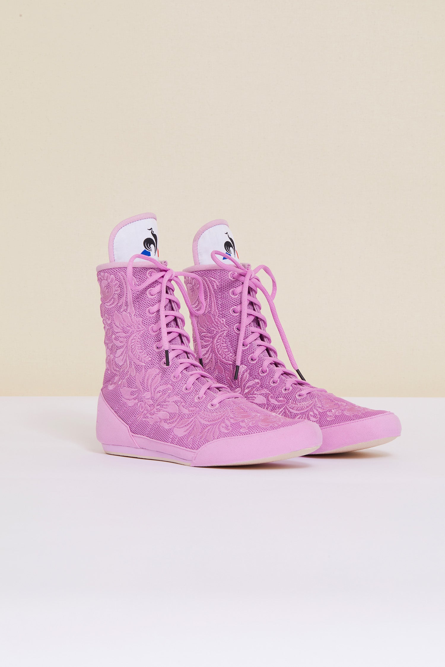 Patou - Embroidered high-top trainers - Lilac - Lilac - Couture florals are the embellishment du jour.  First collaboration between Patou and Le Coq Sportif. Lilac high-top trainers inspired by classic boxing shoes. Monochrome floral embroideries, Patou logo engraved on the heel. Original Le Coq Sportif logo on the tongue. Flexible rubber sole with embossed Patou logo.