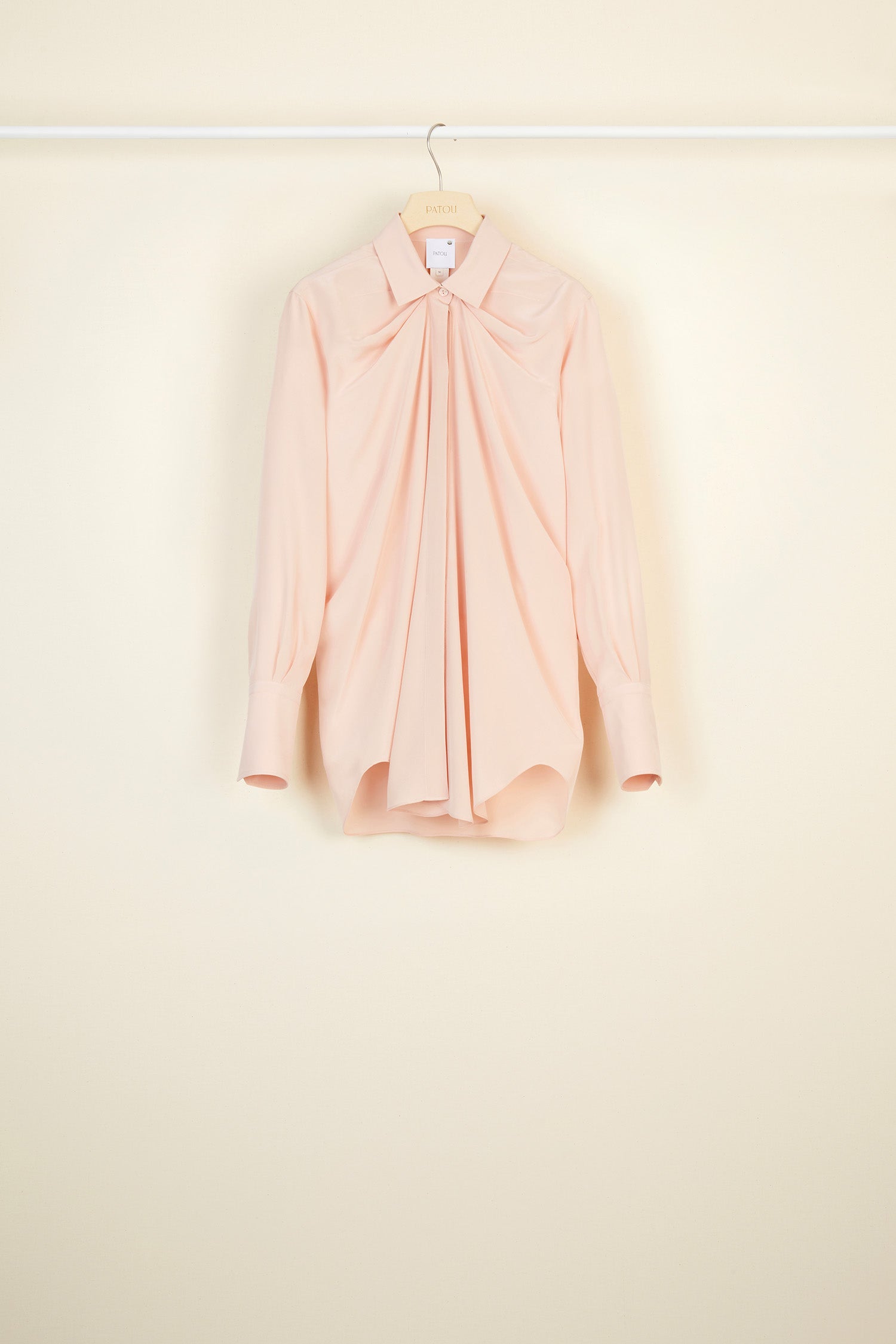 Patou - Draped silk blouse - Golden Beige - Delicately draped, effortlessly elegant.Golden beige silk blouse. Longline draped silhouette with shirring at the neckline. Engraved mother of pearl buttons at the collar and cuffs ; concealed button fastening. Signature curved seam at the back.