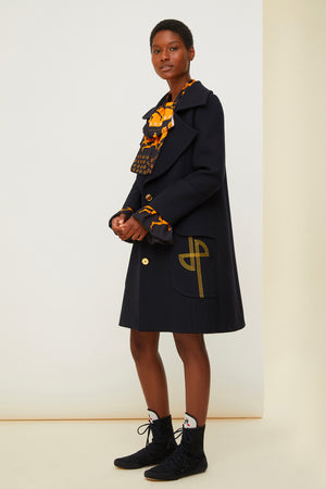 Longline wool coat with embroidered logo