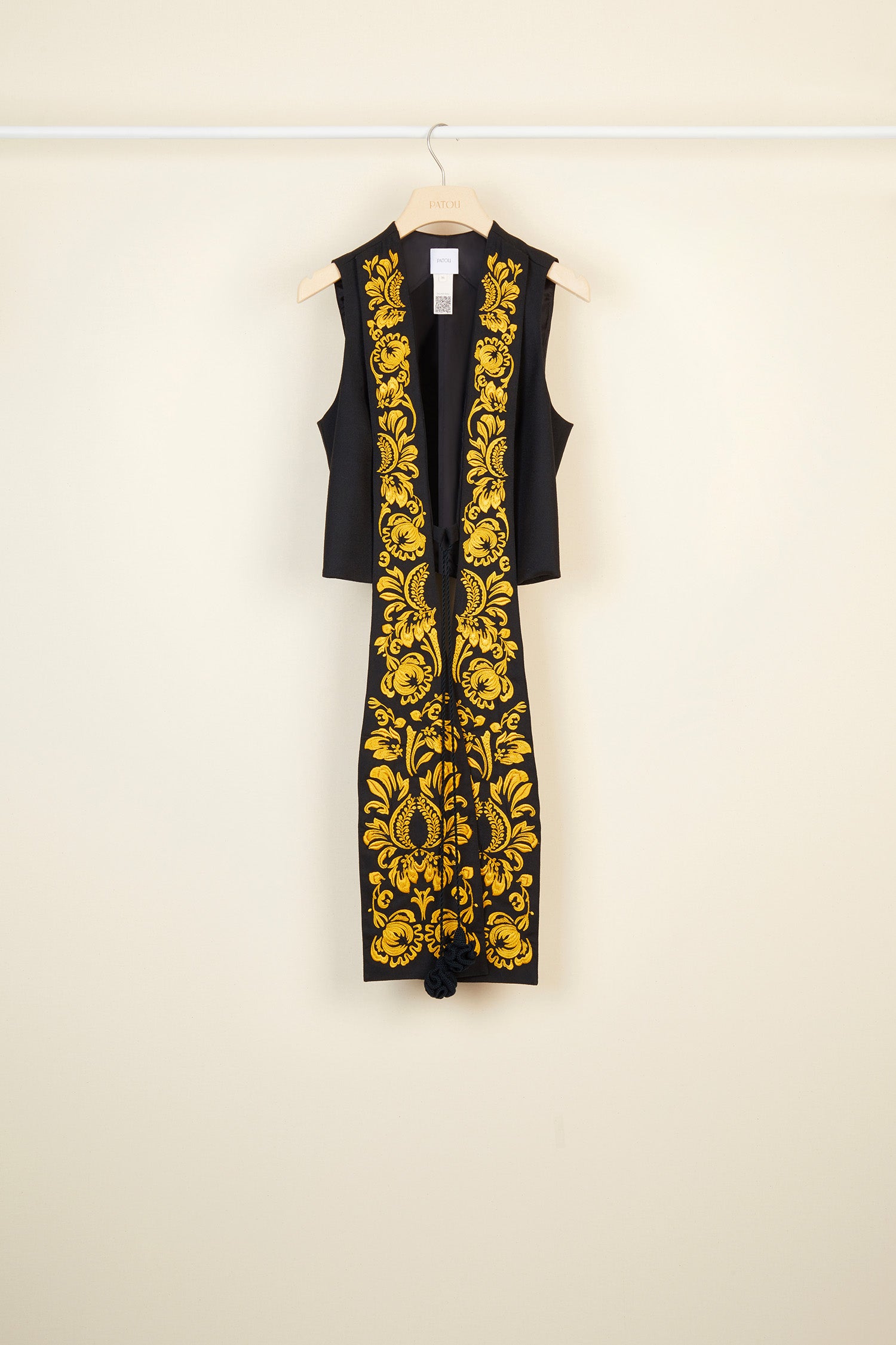 Patou - Embroidered lapel velvet gilet - Storm - Embroidered and elongated: the evolution of the lapel. Storm velvet gilet with exaggerated lapels featuring gold floral embroideries. Cord fastening at the front with crochet pompon embellishments. Self-tie martingale at the back.